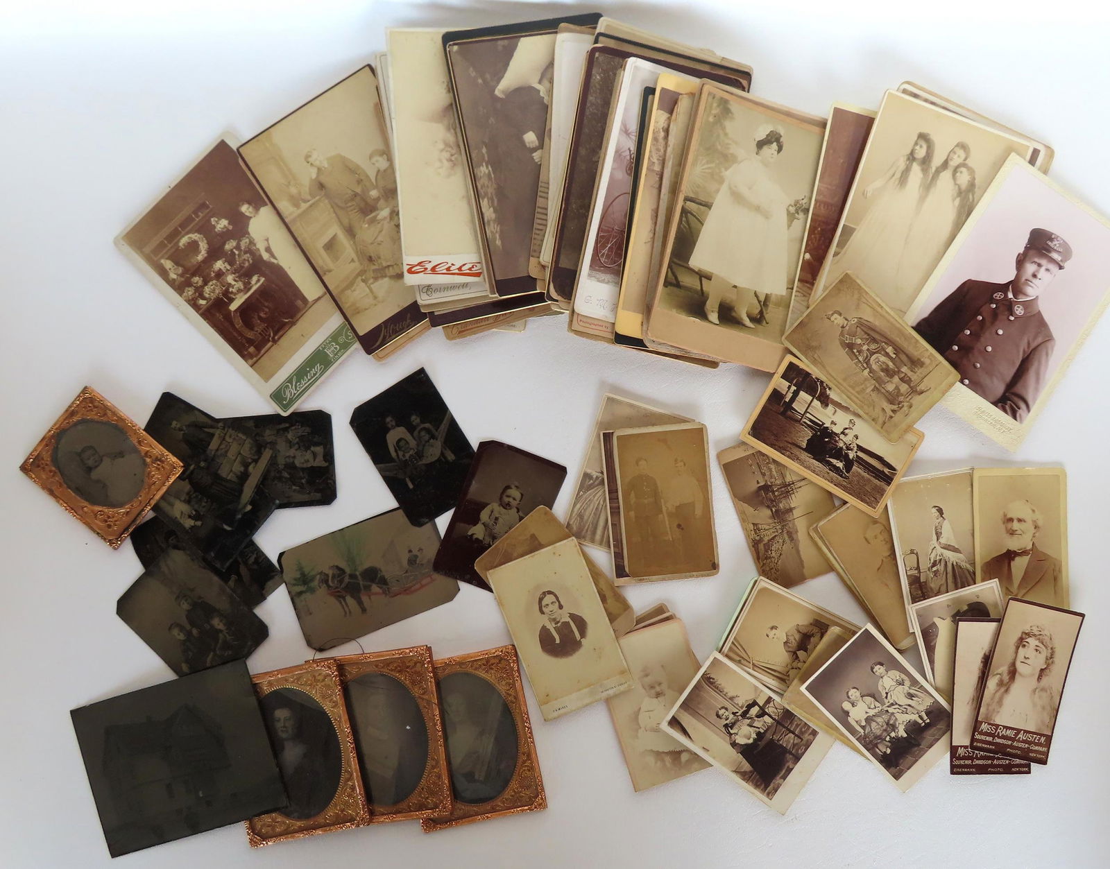 Grouping of 37 cabinet cards, 24 CDV's and 14 tintype photos. Cabinet cards include:  Children - (1 of 8)