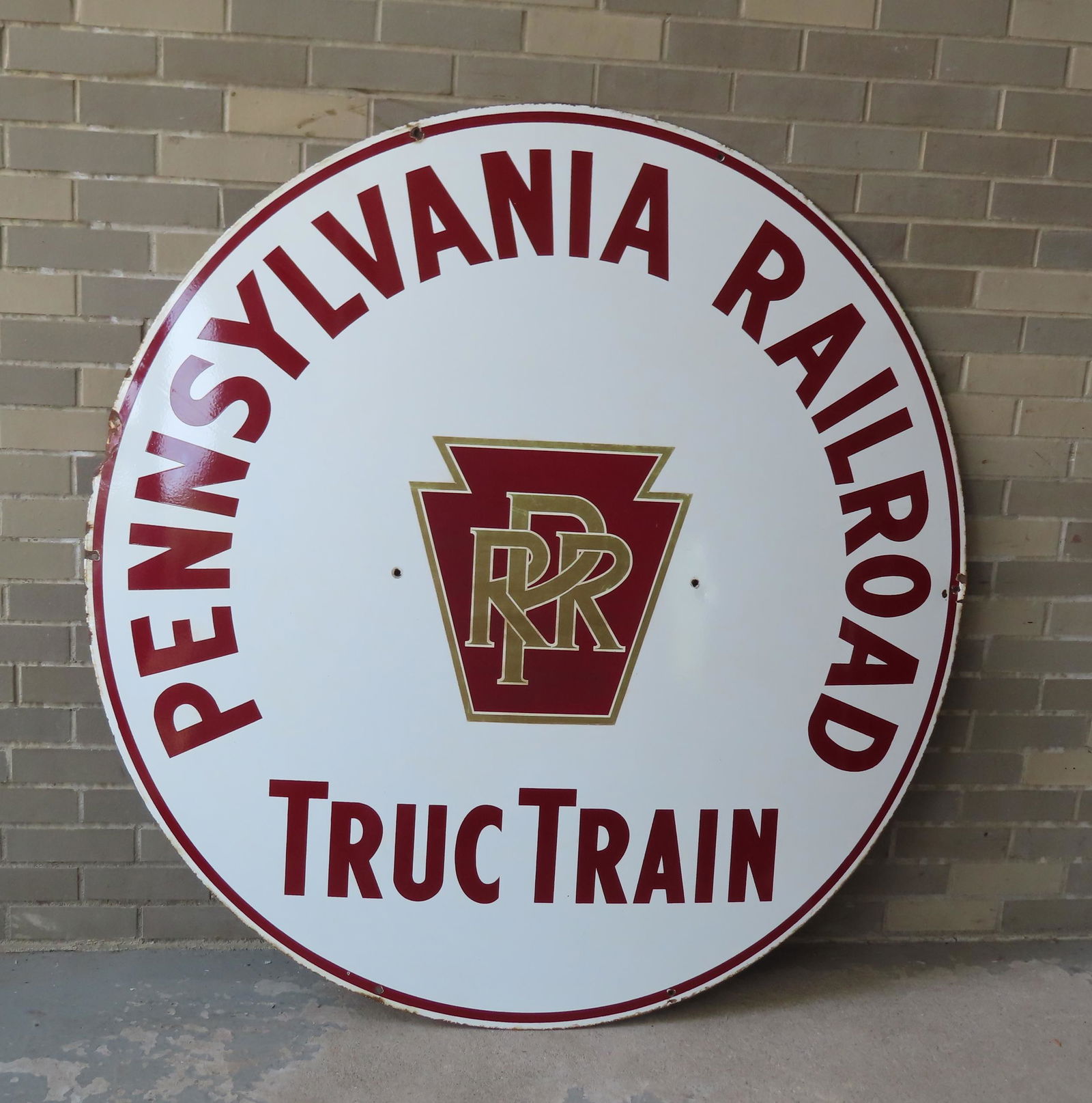 Large circular porcelain "Pennsylvania Railroad Truc Train" sign, very good condition. Measures xxxx (1 of 5)