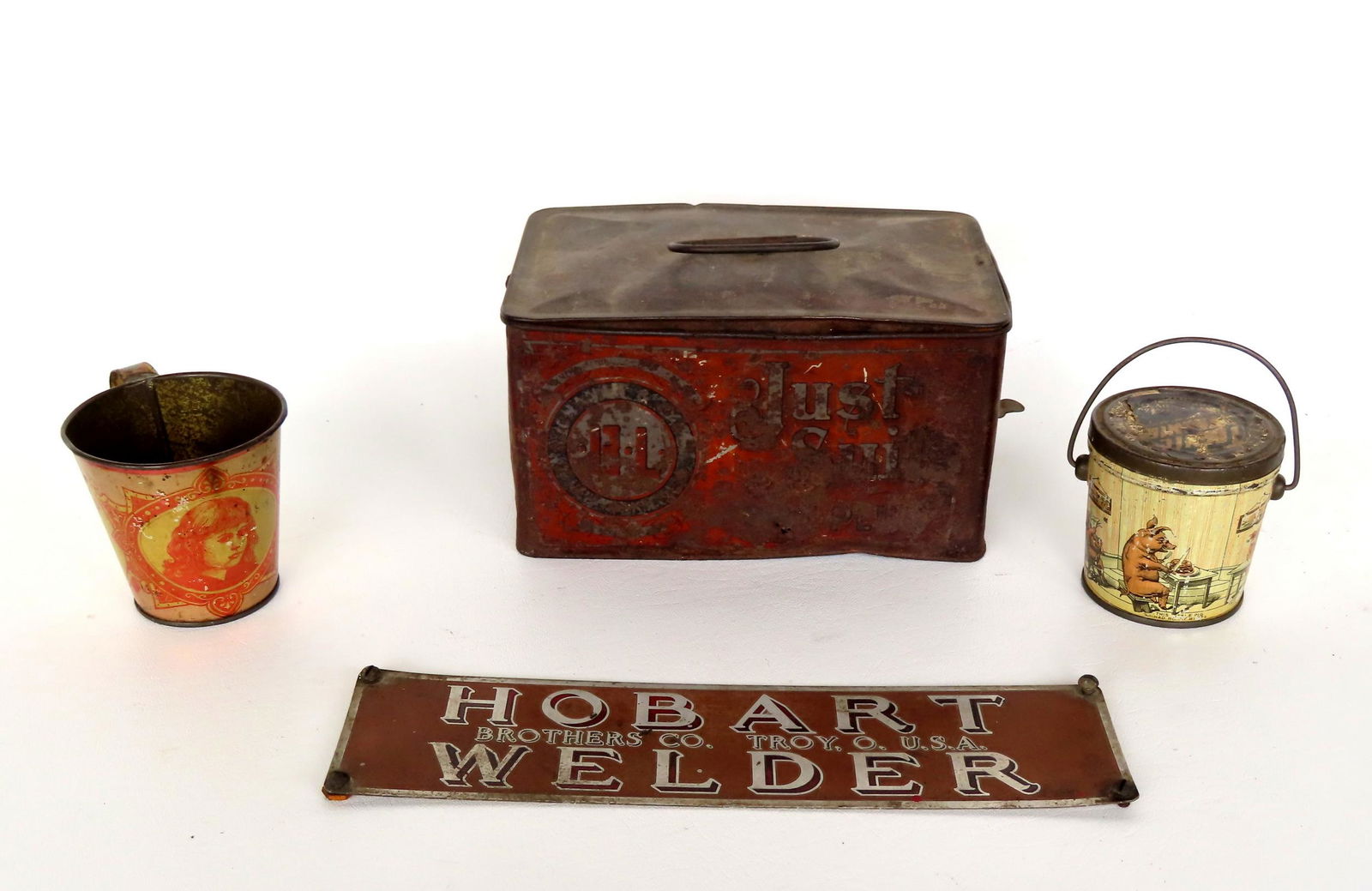Grouping of 4 advertising  items including: Lithograph candy tin with bail handle with images of (1 of 6)