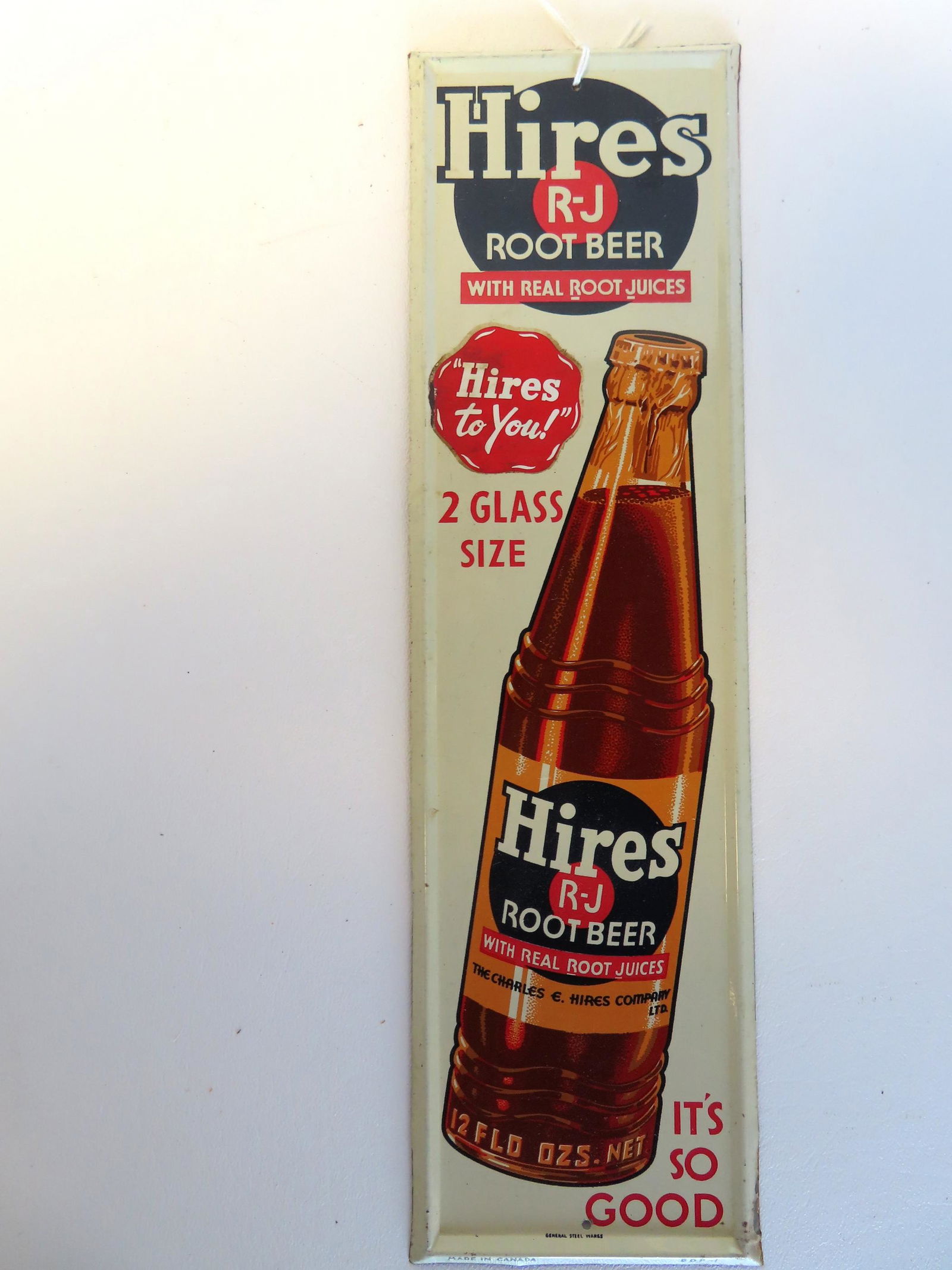 A small lithograph tin "Hires R-J Root Beer" sign. Marked at base "General Steel Wares / Made in (1 of 3)