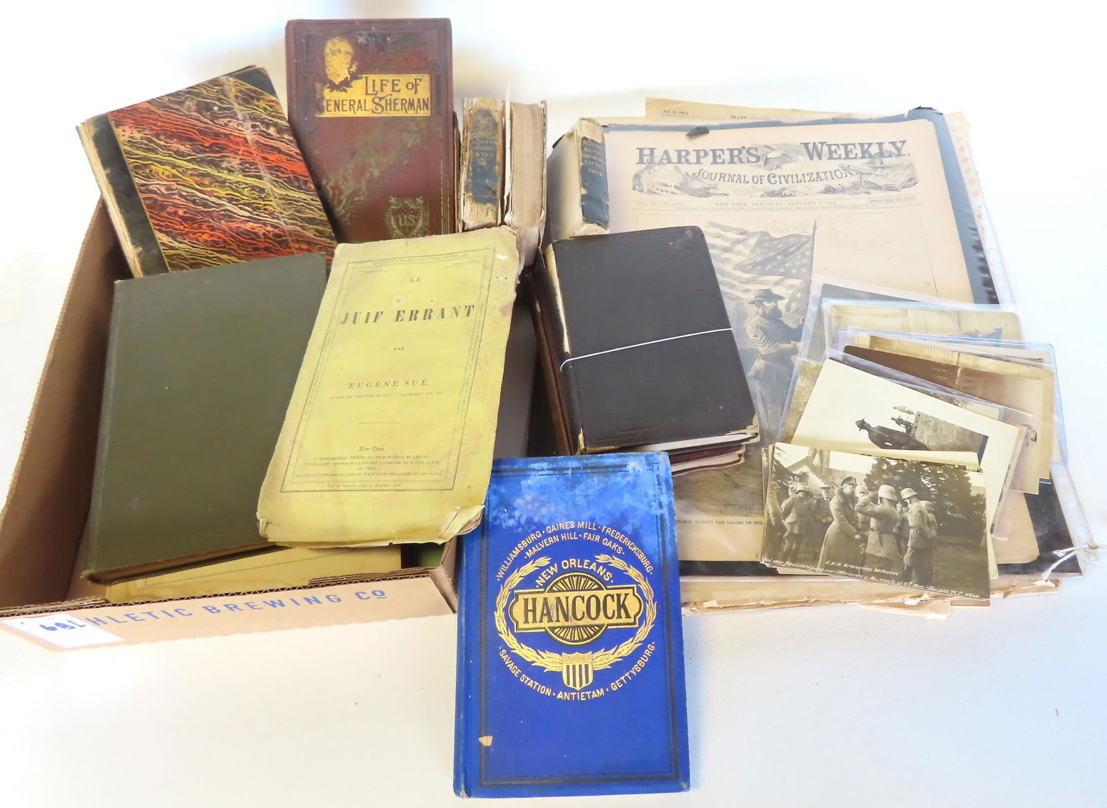 Grouping of early military collectibles including books, newspapers, and post cards: 24 military (1 of 17)