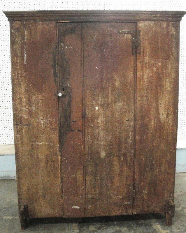 Fine primitive 18th c. single-door floor cupboard.: Fine primitive 18th c. single-door floor cupboard with H & L hinges - old red over grain paint - cornice molding - beaded column-style corners - four interior shelves - rose head nail construction - c
