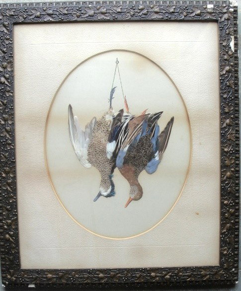 Framed Feather Art: of 2 hanging game birds: Framed Feather Art picture of two 19th c. hanging game birds in natural feathers with watercolor beaks and watercolor legs - 14" x 18"