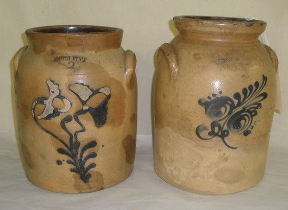 Two stoneware crocks inc. White's, Utica, NY with: Two stoneware crocks inc. White's, Utica, NY with double blue flower (some staining and losses to cobalt blue), plus two-gallon signed New York Stoneware Co., Fort Edward, NY with blue-decorated flowe
