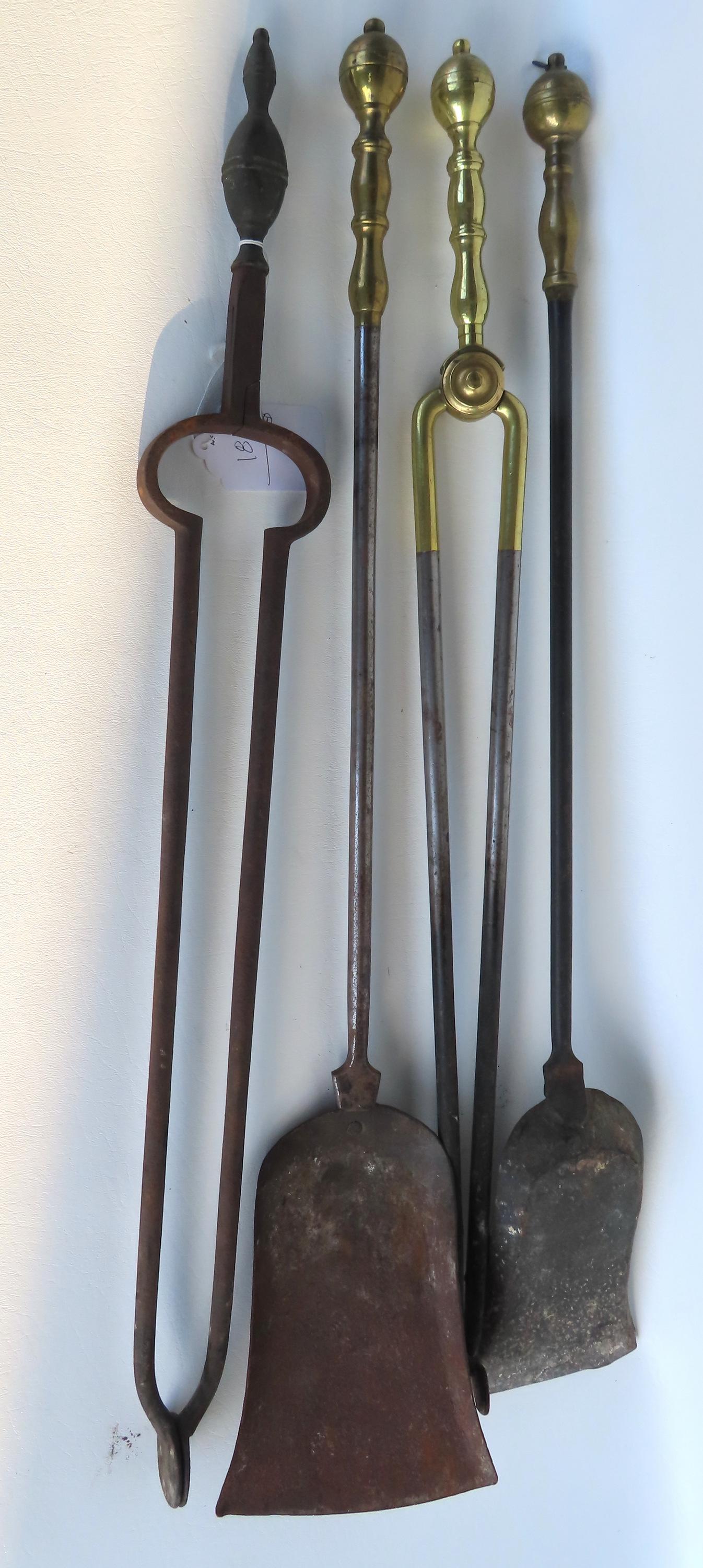 Grouping of 4 early brass and iron fireplace tools including a matched pair of Chippendale tools-: Grouping of 4 early brass and iron fireplace tools including a matched pair of Chippendale tools- shovel and tongs with brass ball top handles; another pair of iron tongs having brass double lemon top