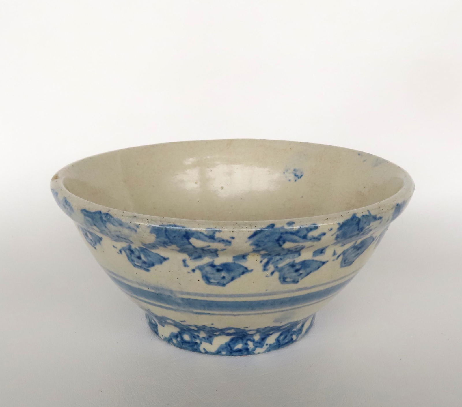 A good blue and white spongeware mixing bowl with concentric center