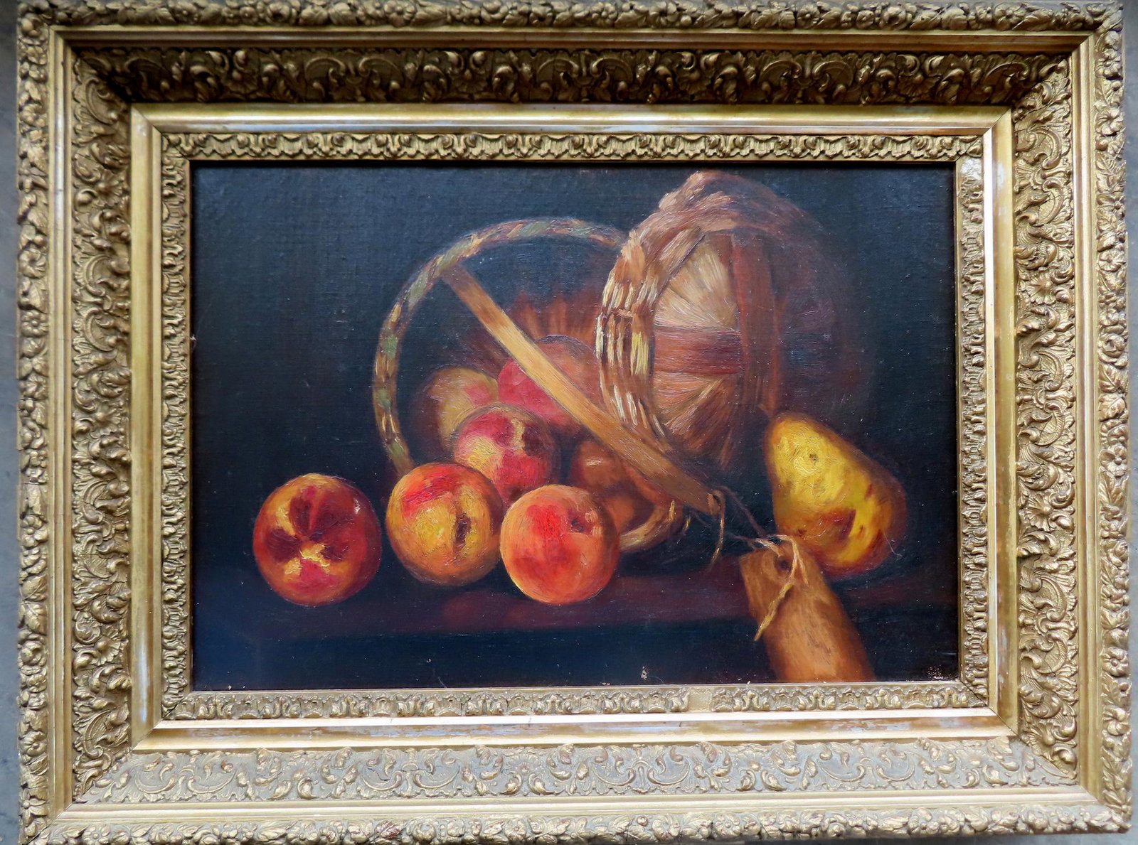 O/C Still life of peaches in a basket, very good condition, late 19th century. Mounted in a good: O/C Still life of peaches in a basket, very good condition, late 19th century. Mounted in a good gilt gesso frame in good condition that appears to be original. The painting without damage or repairs 