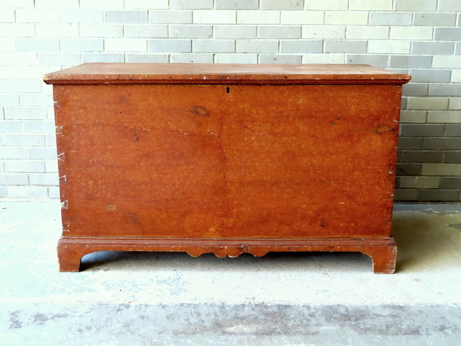Large faux birds-eye maple (grain painted) blanket box, dovetailed case mounted on original bracket: Large faux birds-eye maple (grain painted) blanket box, dovetailed case mounted on original bracket base, mid 19th century. Original lock and butt hinges - very good condition. Measures 49 3/4"W x 24