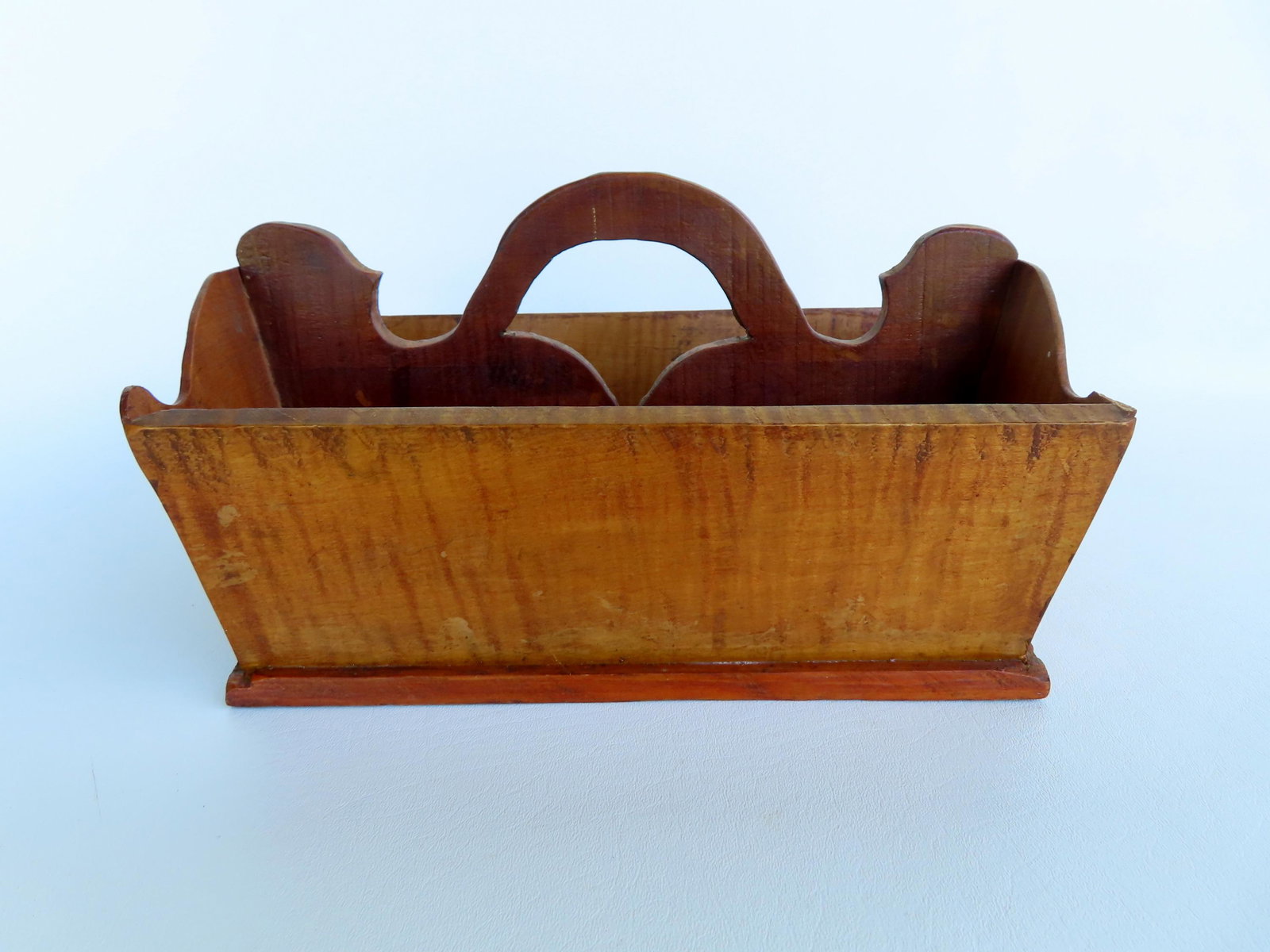 An exceptional tiger maple cutlery tray with shaped sides and handle, 19th century, very good: An exceptional tiger maple cutlery tray with shaped sides and handle, 19th century, very good condition. Measures 12 1/4"W x 9 1/4"D x 7"H. Provenance: From the estate of Barbara Becker, High Falls NY