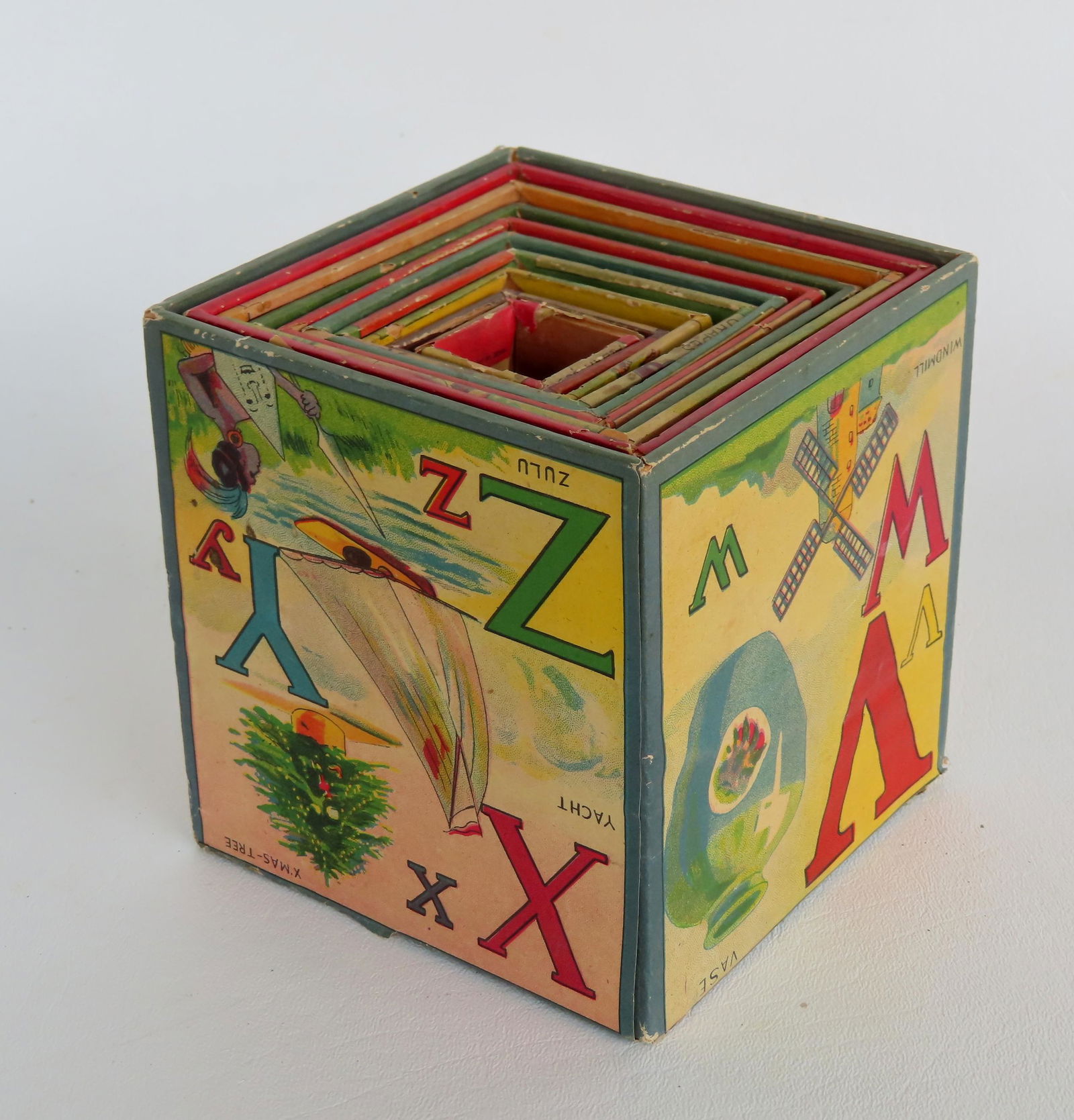 A set of lithograph kids nesting blocks, 19th century, all in very good condition. Circa 1900 The: A set of lithograph kids nesting blocks, 19th century, all in very good condition. Circa 1900 The largest measures 4 3/4" square. Complete set.