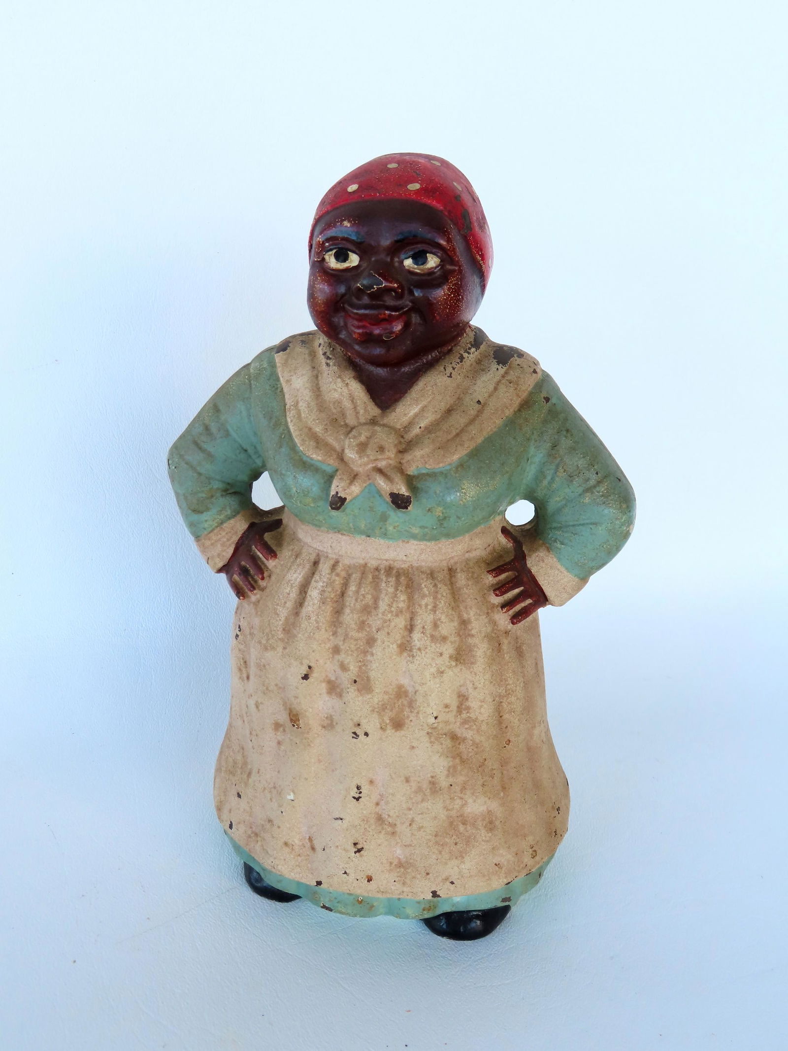 An Aunt Jemima cast iron door stop in original paint, very good condition, early to mid 20th: An Aunt Jemima cast iron door stop in original paint, very good condition, early to mid 20th century. Measures 8 1/2"H.