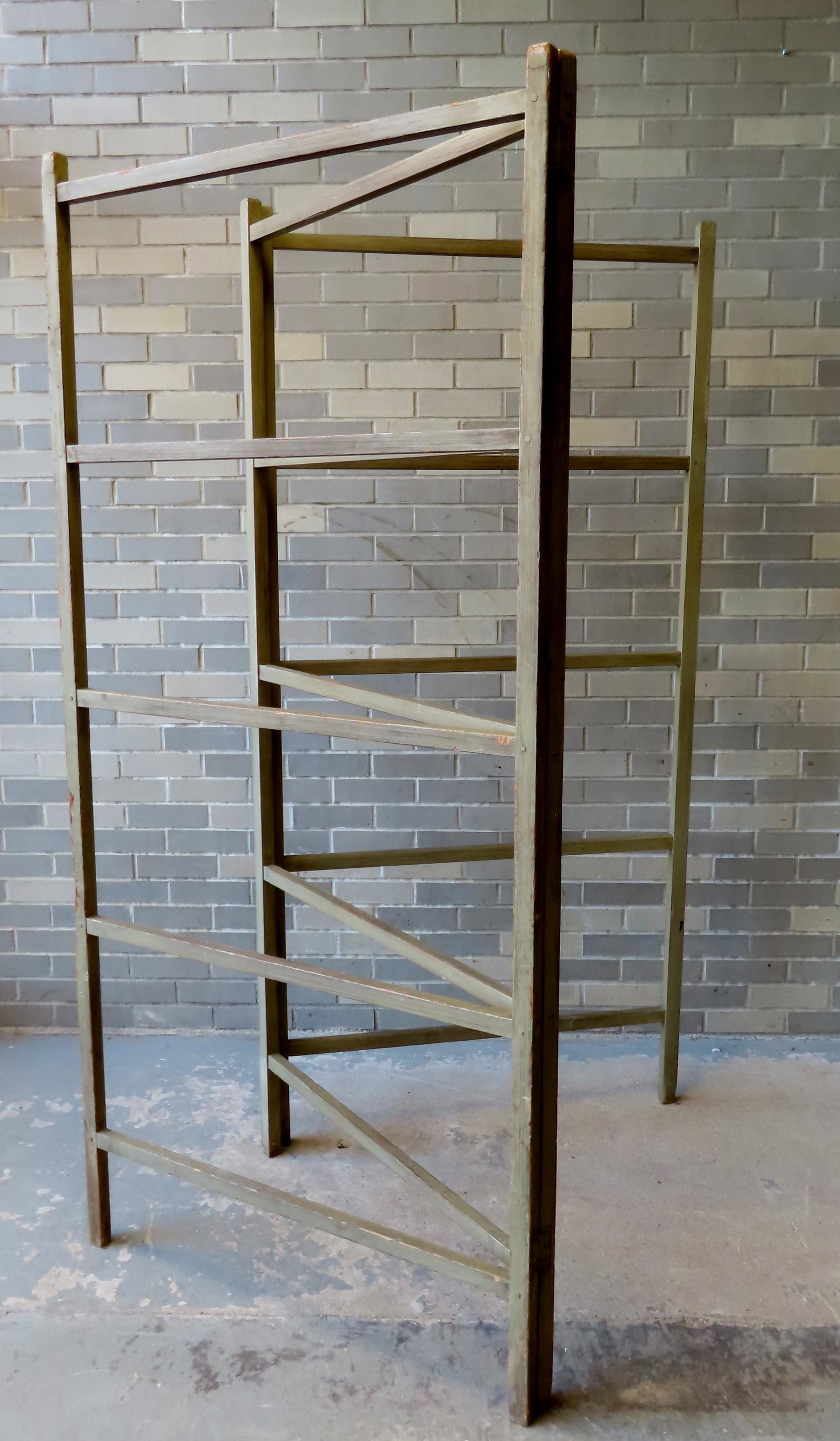 A primitive 19th century 3 section drying rack, mortise and tenon construction. Good condition in: A primitive 19th century 3 section drying rack, mortise and tenon construction. Good condition in old paint. Measures 36 1/4"W x 76"H.