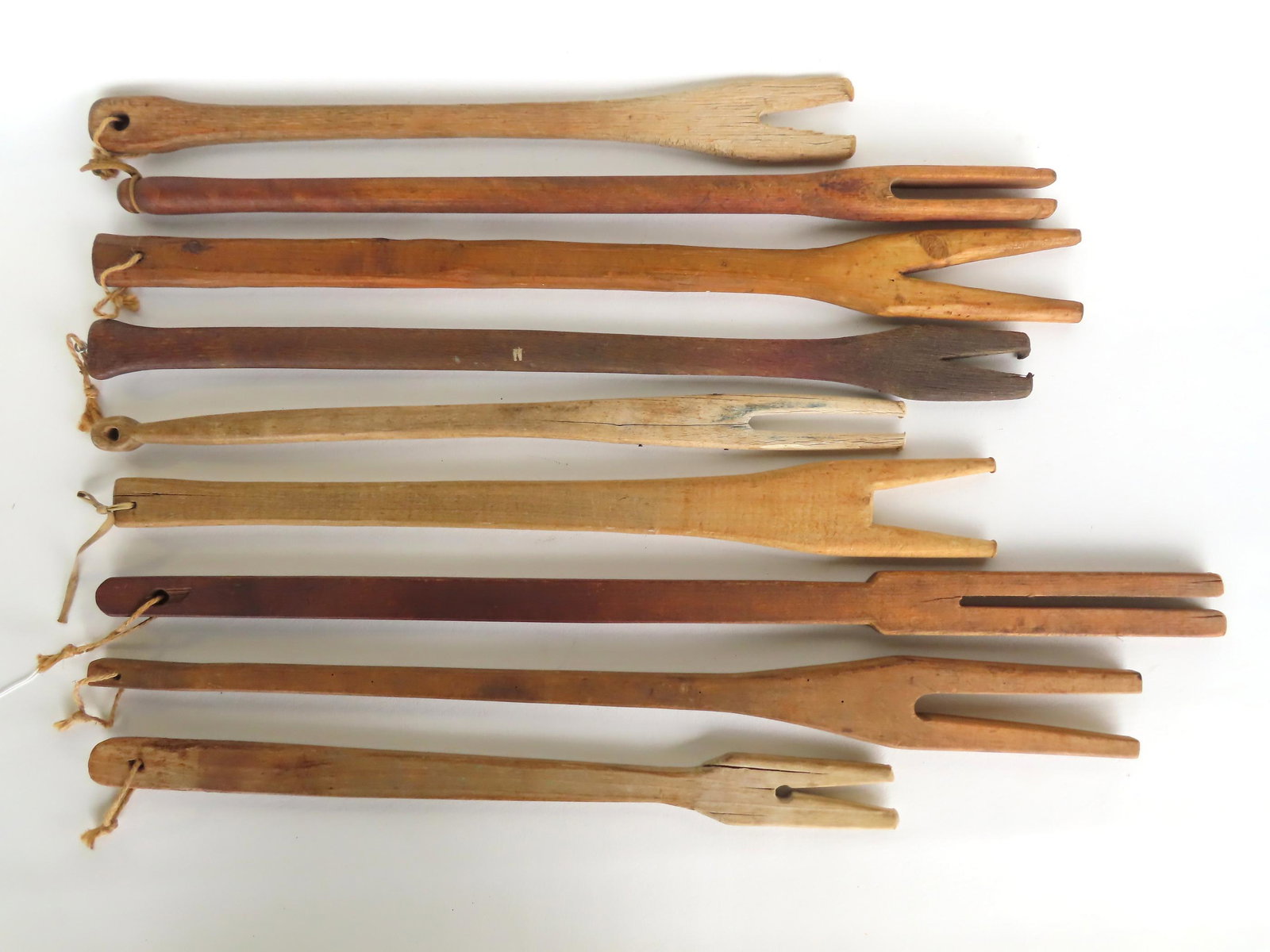 Grouping of 9 hand made wash sticks, 19th century, very good condition. The largest measures 35"L.: Grouping of 9 hand made wash sticks, 19th century, very good condition. The largest measures 35"L. Provenance: From the estate of Barbara Becker, High Falls NY. This lot is part of her 60 year collect