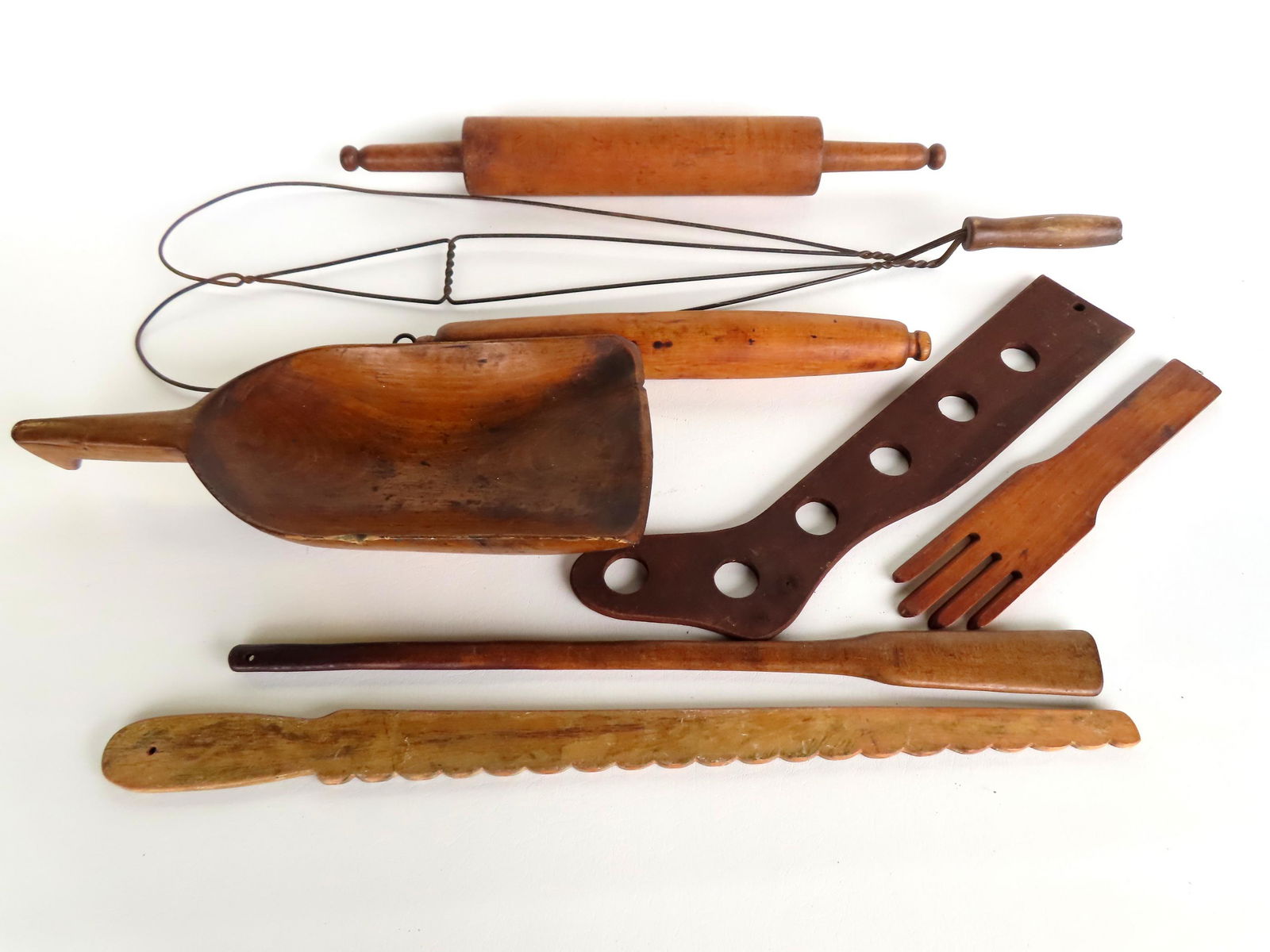 Grouping of country items, most 19th century including carpet beater, stocking stretcher, 2 rolling: Grouping of country items, most 19th century including carpet beater, stocking stretcher, 2 rolling pins, glove stretcher, etc. Most items in good condition. Largest measures 31"L x 9"W. Provenance: F