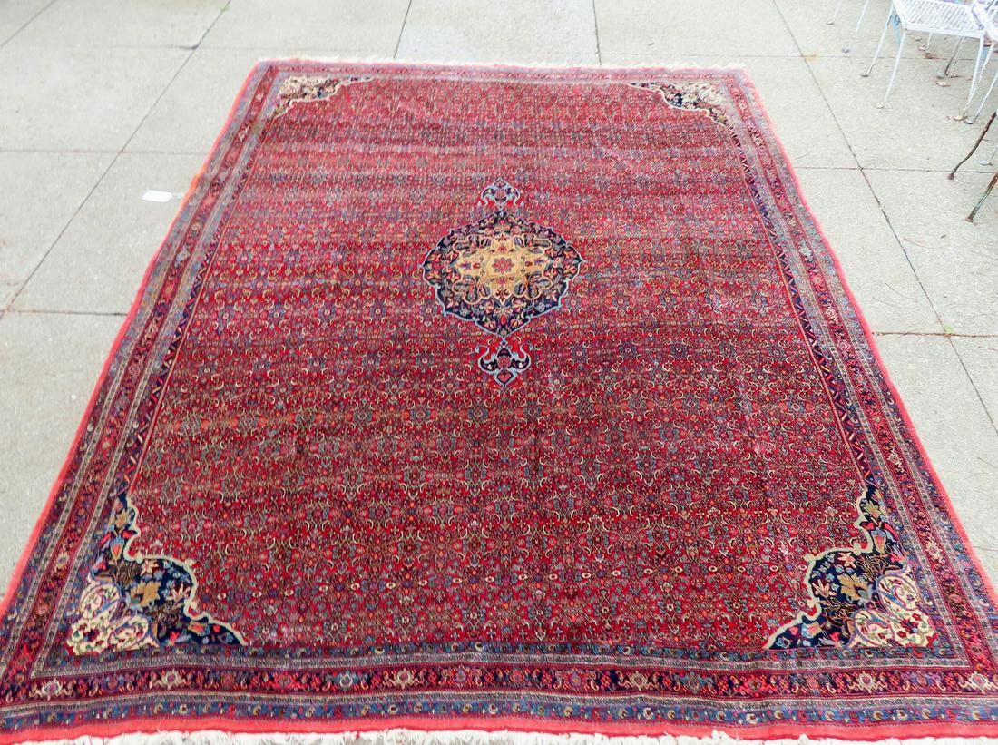 A very high quality room size Persian carpet, with original label on reverse indicated Made in Iran,: A very high quality room size Persian carpet, with original label on reverse indicated Made in Iran, early to mid 20th century, very tight knotting. Measures 9' 3" x 12' 5".