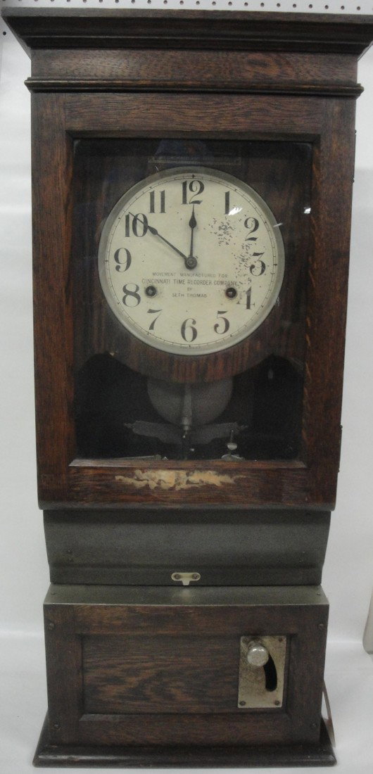 Seth Thomas time-recording clock signed Cincinnati: Seth Thomas time-recording clock signed Cincinnati Time Recorder Company - in oak case - 16" x 35"