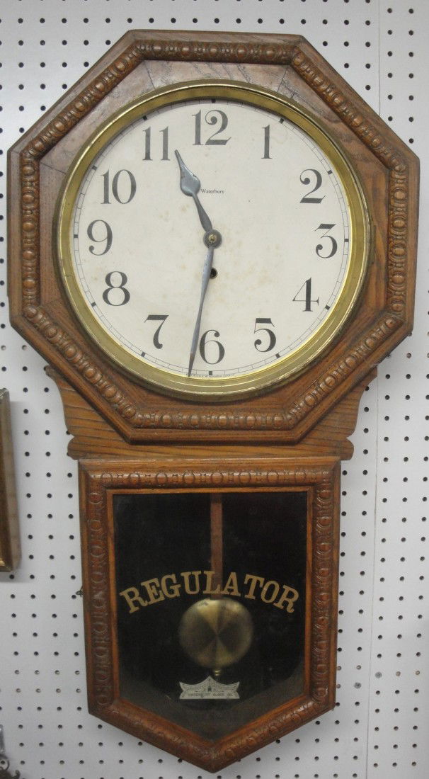 Oak regulator wall clock signed Waterbury Clock Com: Oak regulator wall clock signed Waterbury Clock Company - 32" height