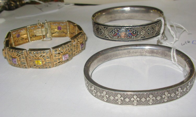 Three lady's bracelets - G.A.Sheid, etc.: Two .800 silver lady's bracelets - one enameled and unsigned, the other signed G.A.S. (George Anton Sheid, Vienna silversmith, ca. 1900) together with an Art Deco lady's bracelet with filigree and mul