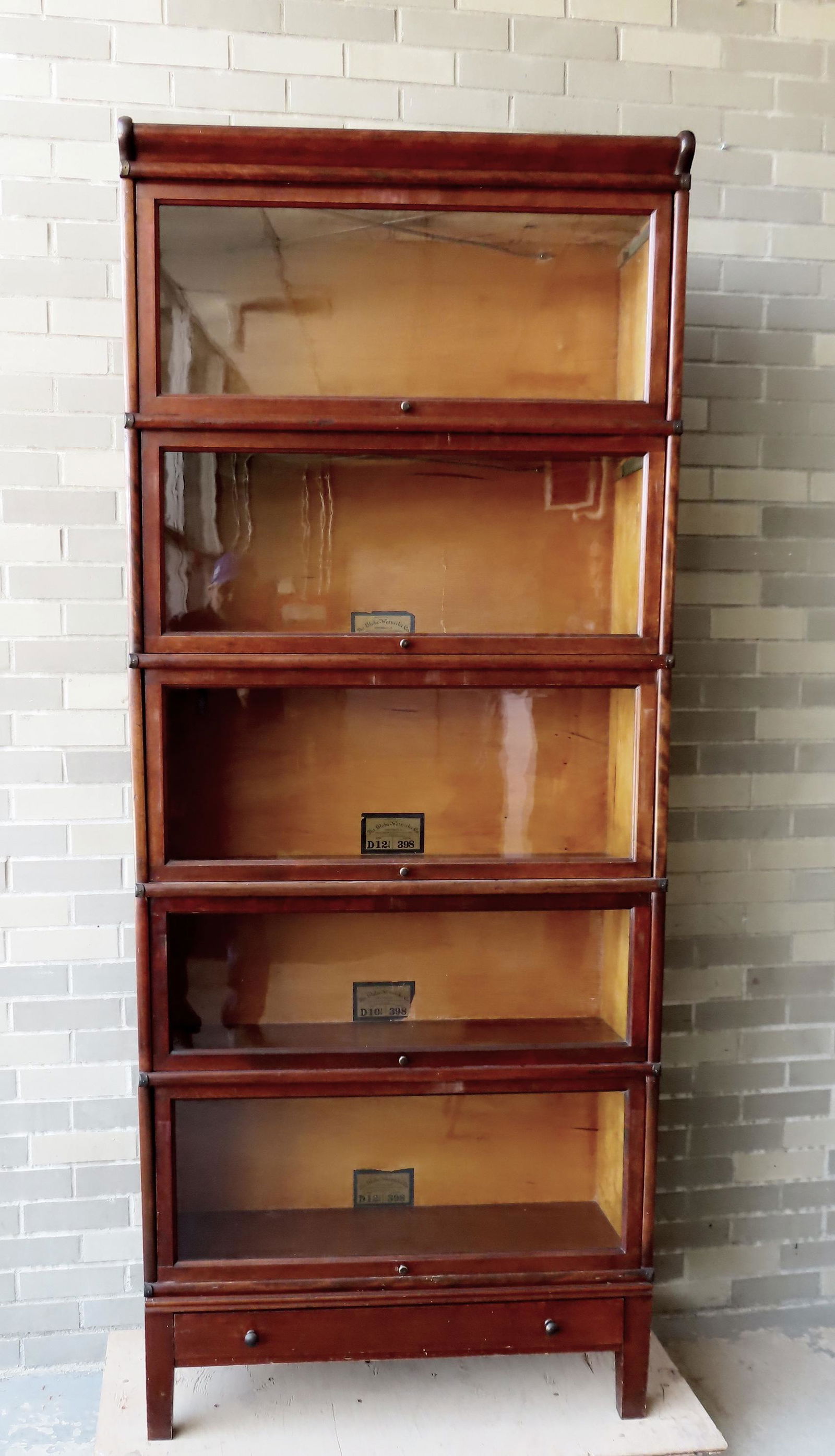 A 5 section Globe Wernicke stacking showcase with lower drawer, in red stained birch (mahogany (1 of 10)