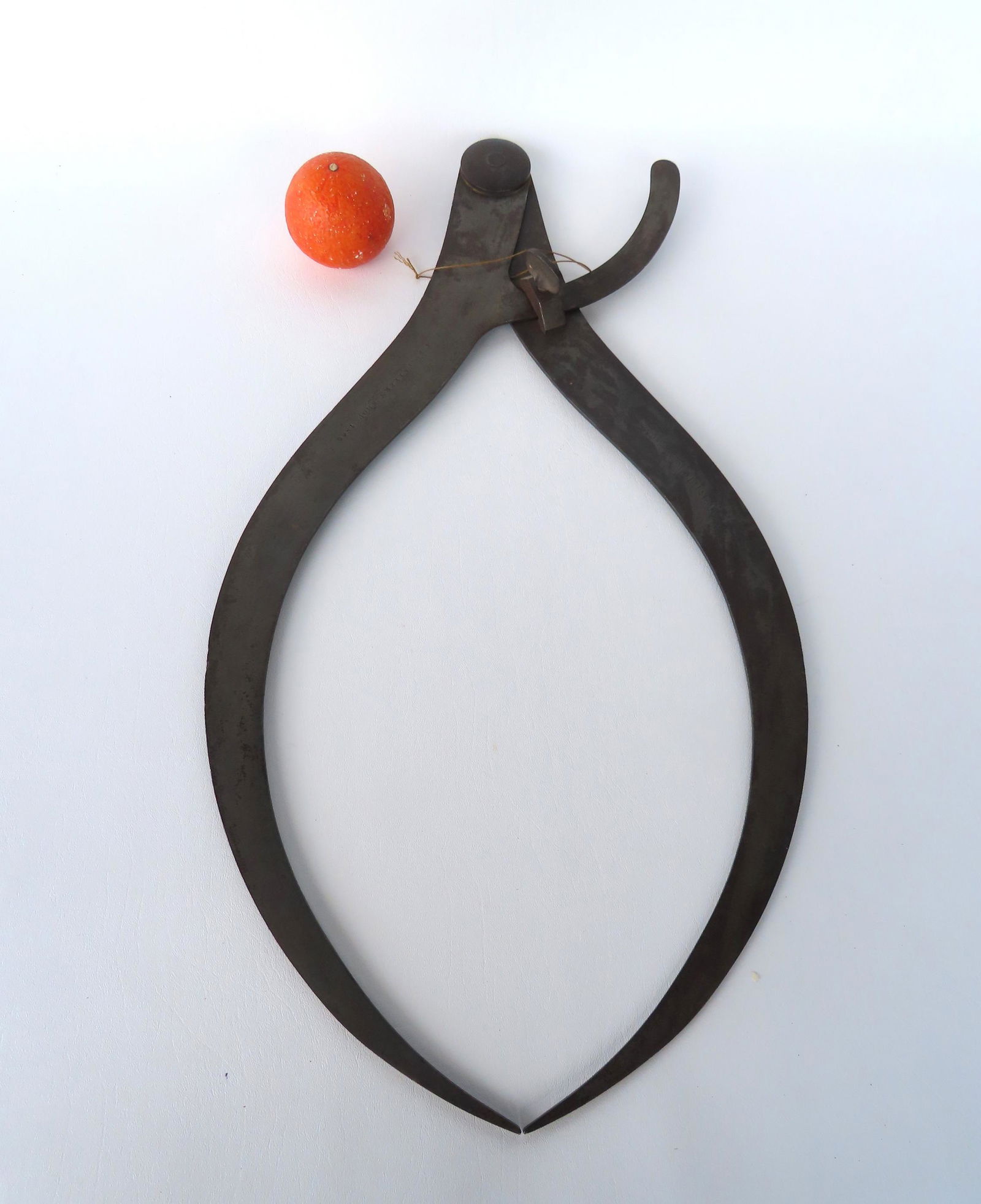 A pair of large iron calipers with impressed mark of "Merrick & Sons / 4 St. Pattern Shop / 1866". (1 of 8)