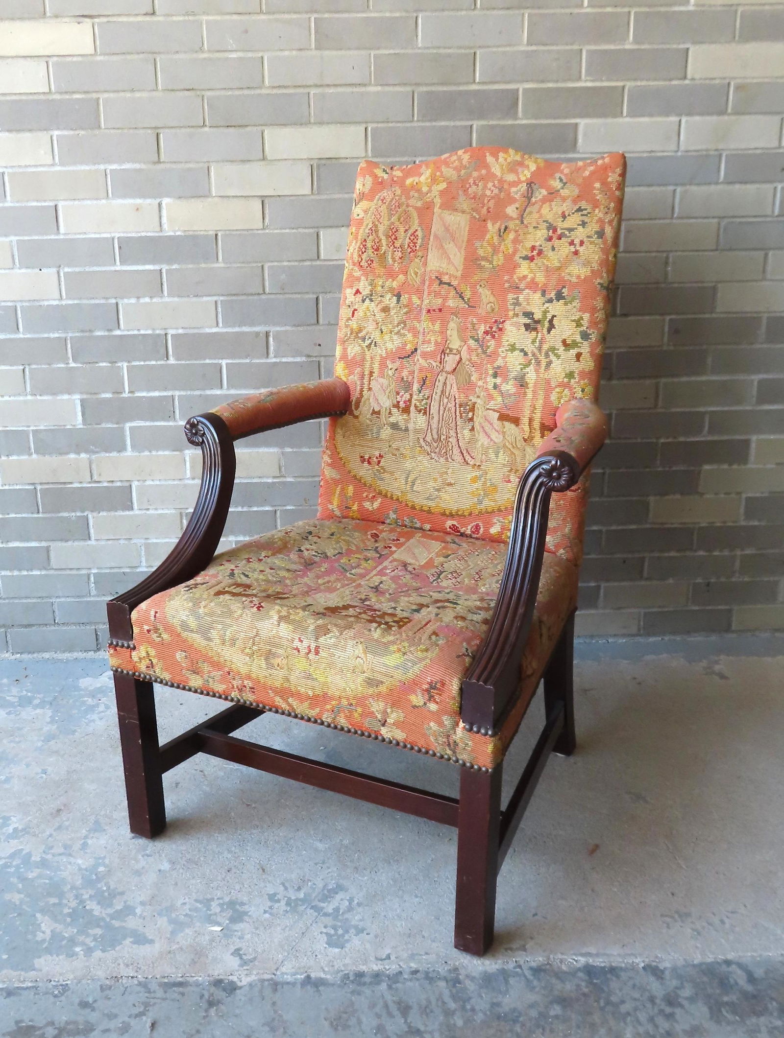 A beautiful tapestry style lolling arm chair having an embroidered seat and back in the French "Lady (1 of 11)