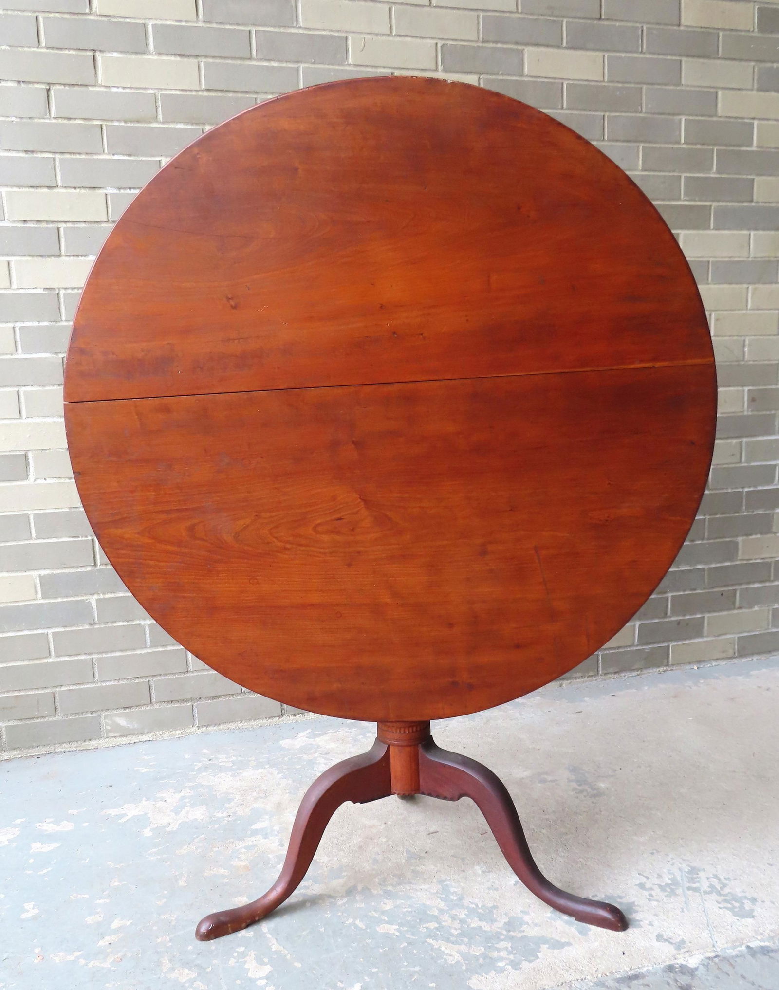Queen Ann cherry tilt top tea table with turned column and snake feet, late 18th century. Note the (1 of 15)