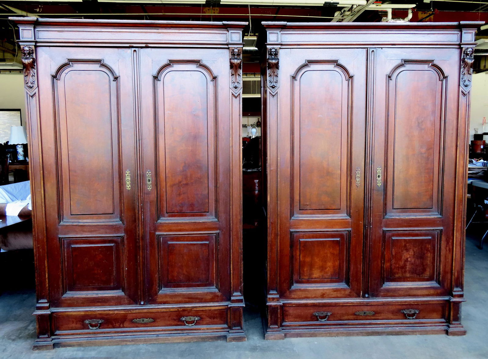 A pair of Renaissance Revival black walnut cupboards, one an armoire with hangers and lower drawer (1 of 20)