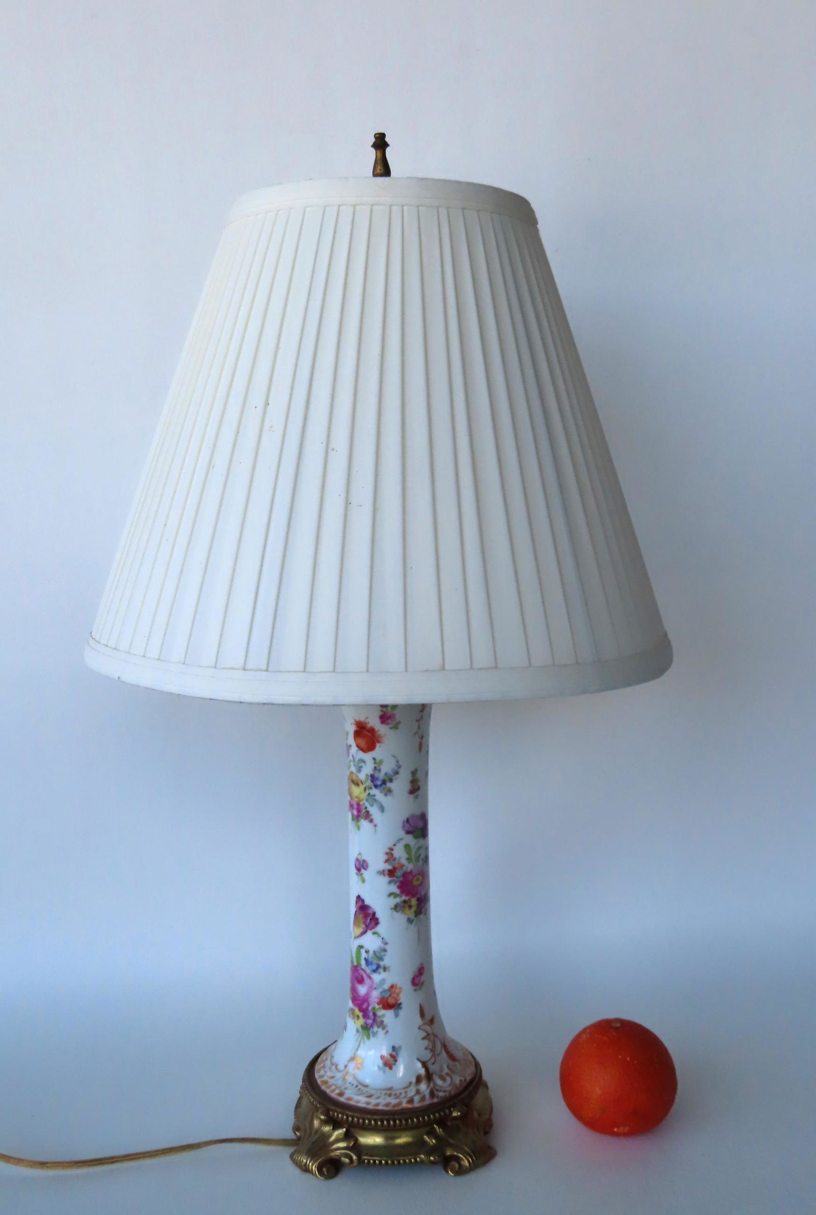 A beautiful porcelain table lamp hand painted with floral decorations and mounted on a gilt metal (1 of 6)