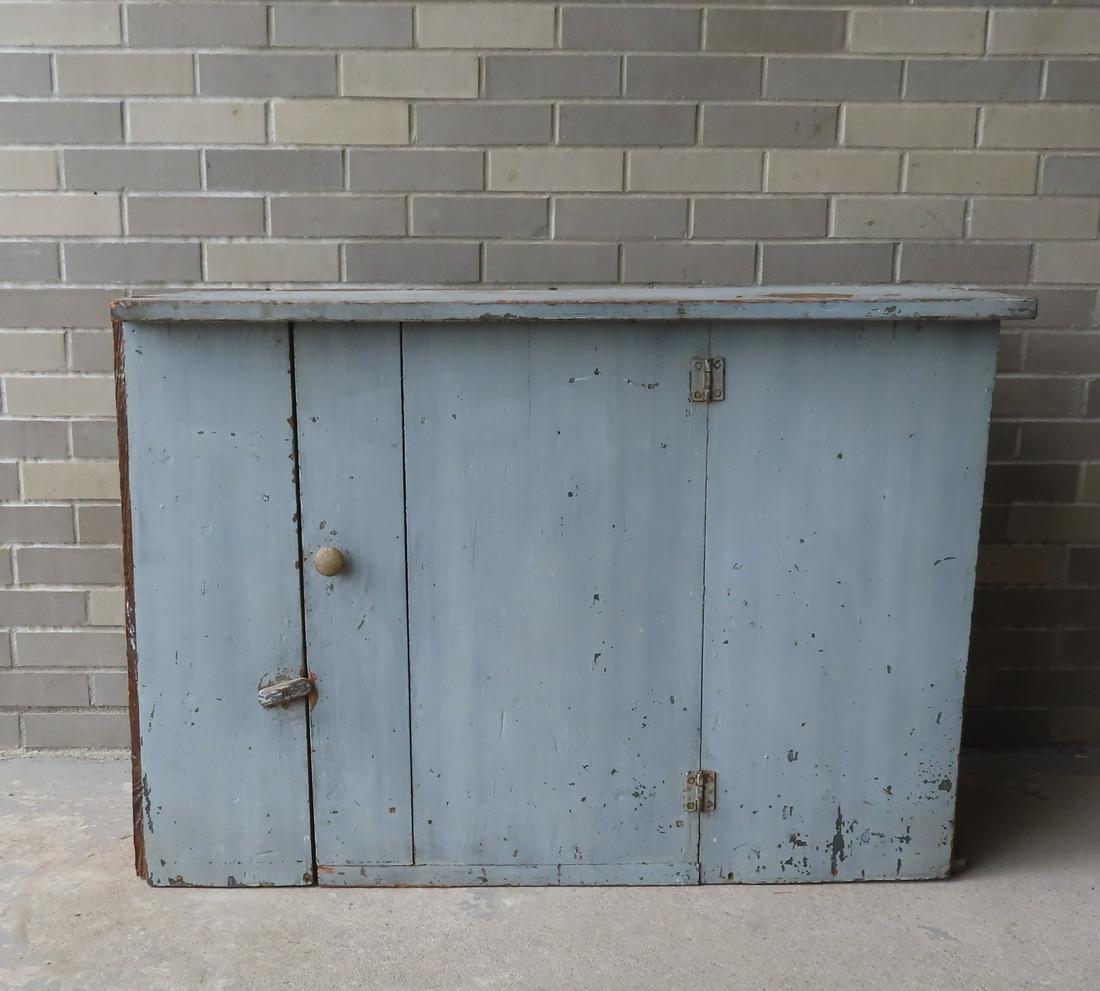 A wall hanging single door cupboard in original blue-gray paint - replaced backboards - overall good (1 of 6)