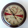 A wall clock signed Self Winding Clock Co. Inc. New York - the clock also marked "Silent period" and