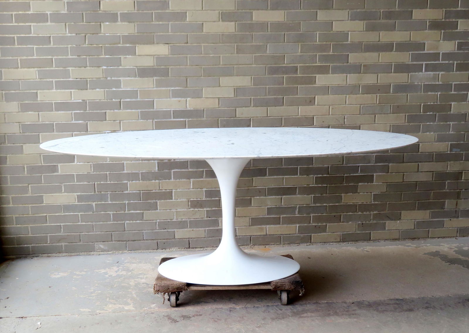 An authentic Knoll, Saarinen design, oval marble top dining room table with tulip base that appears (1 of 15)