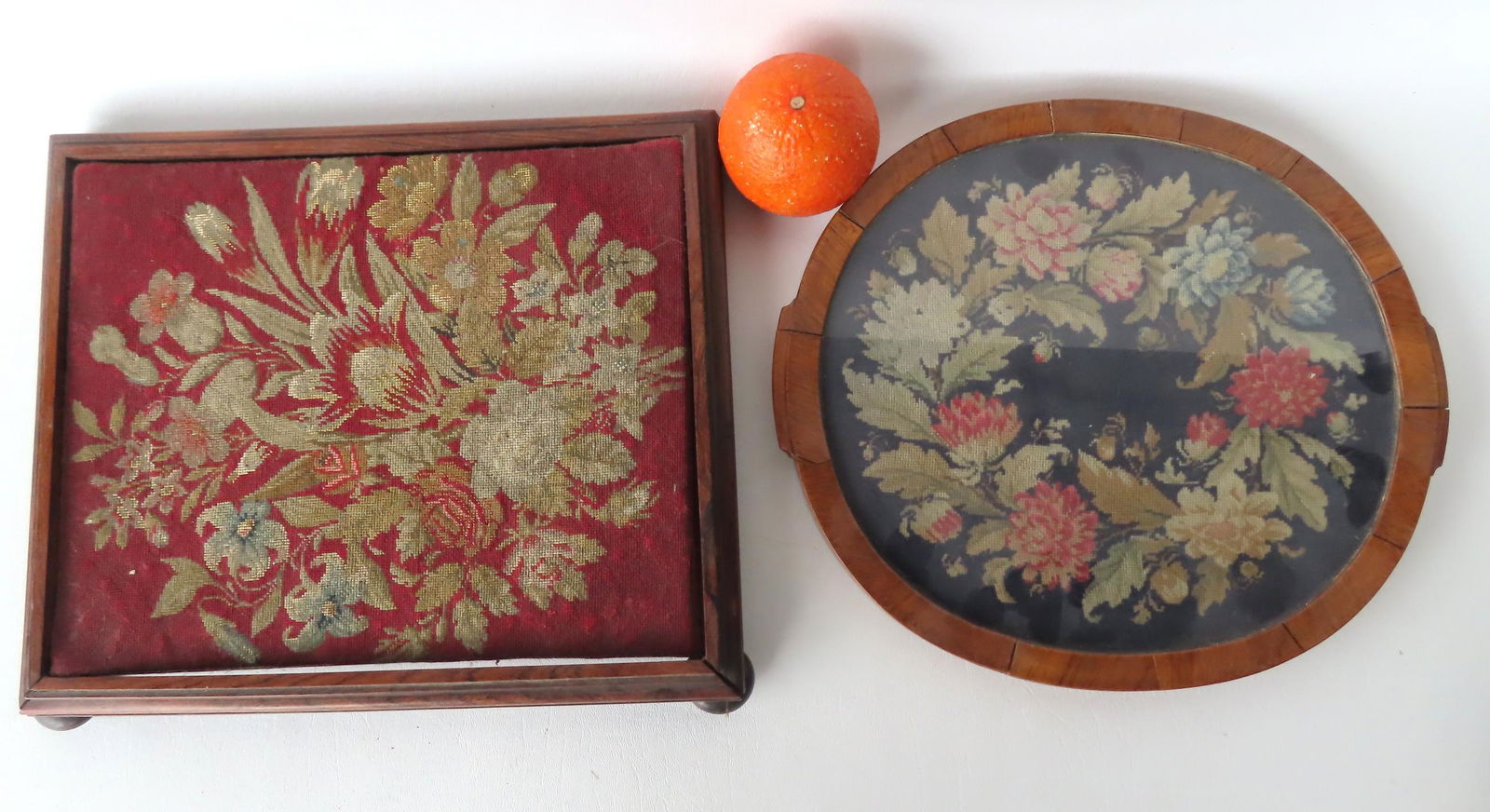 Two needlework serving trays with wooden frames, one with turned feet, 19th century. The oval tray (1 of 7)