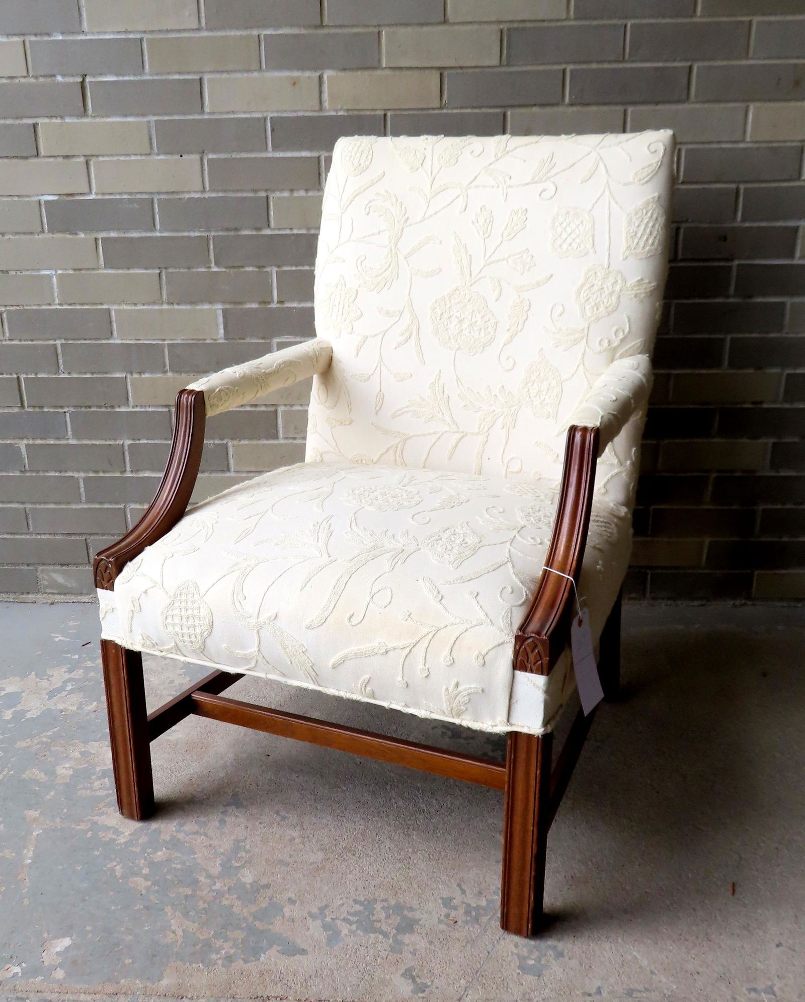 A Chippendale style lolling chair with white crewel work upholstered seat and back. The shaped arms (1 of 13)