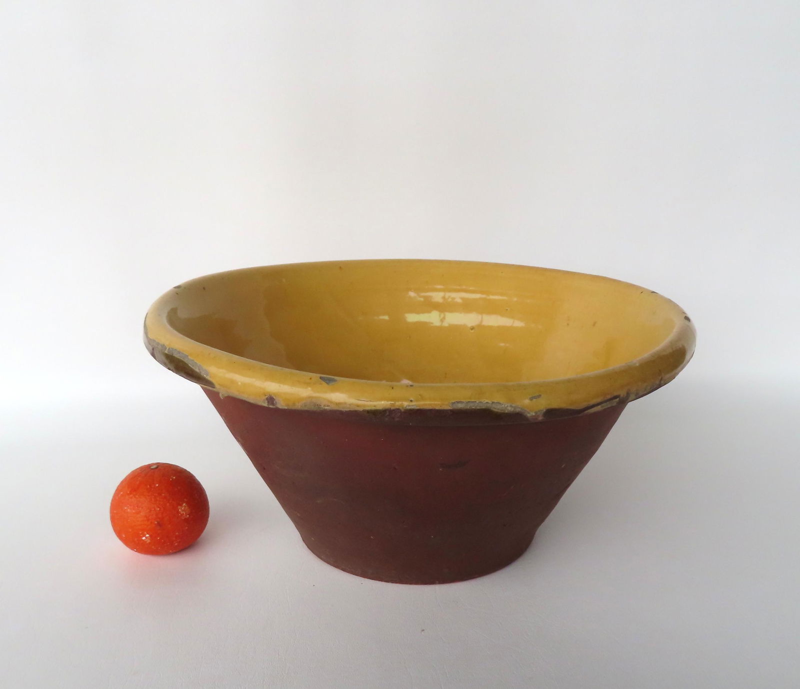 A very large redware pot with yellow glaze - several small glazing imperfections on rim, otherwise (1 of 7)