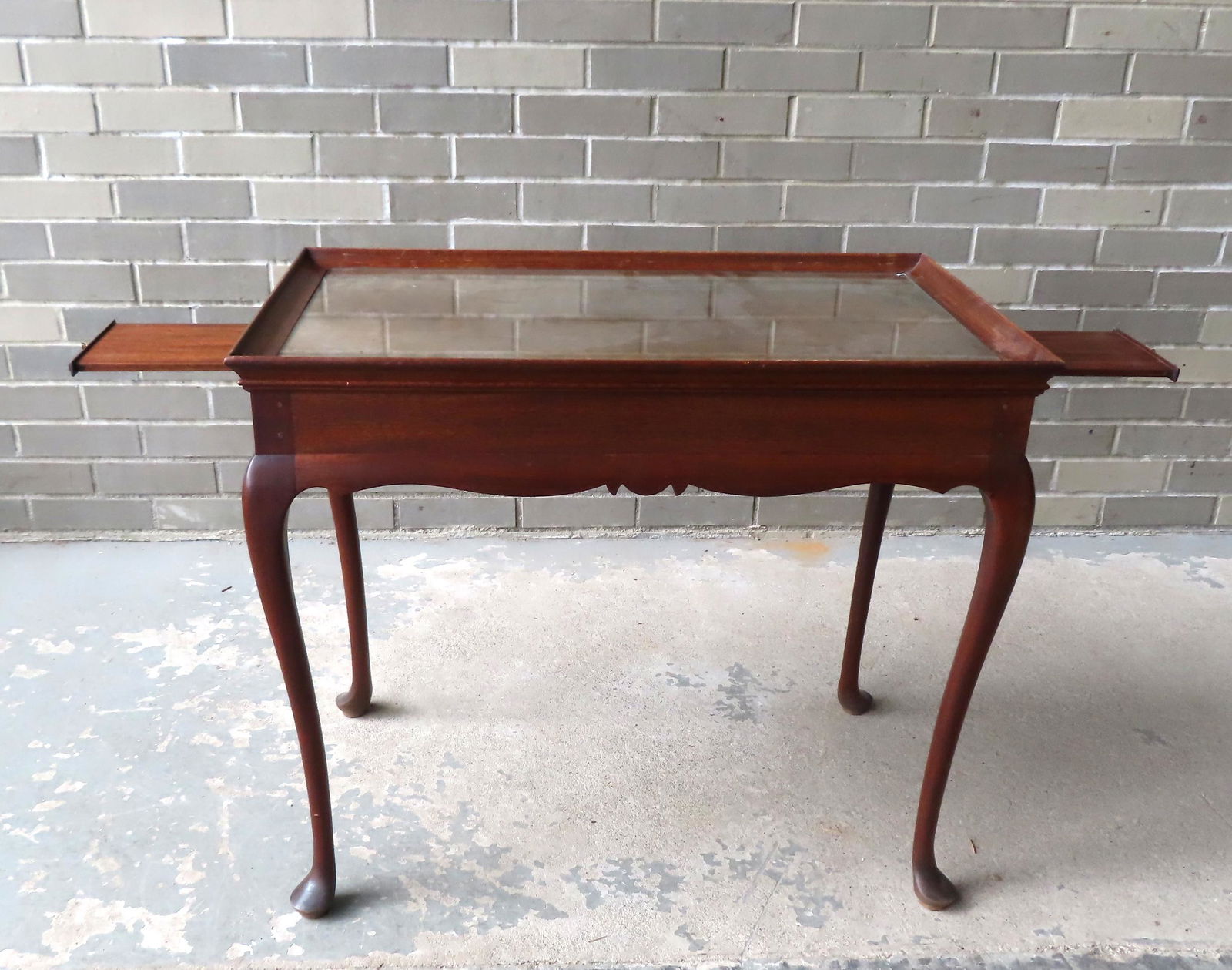 A Thomas Moser Queen Ann style tea table with pullout panels on both ends, and having shaped aprons, (1 of 12)