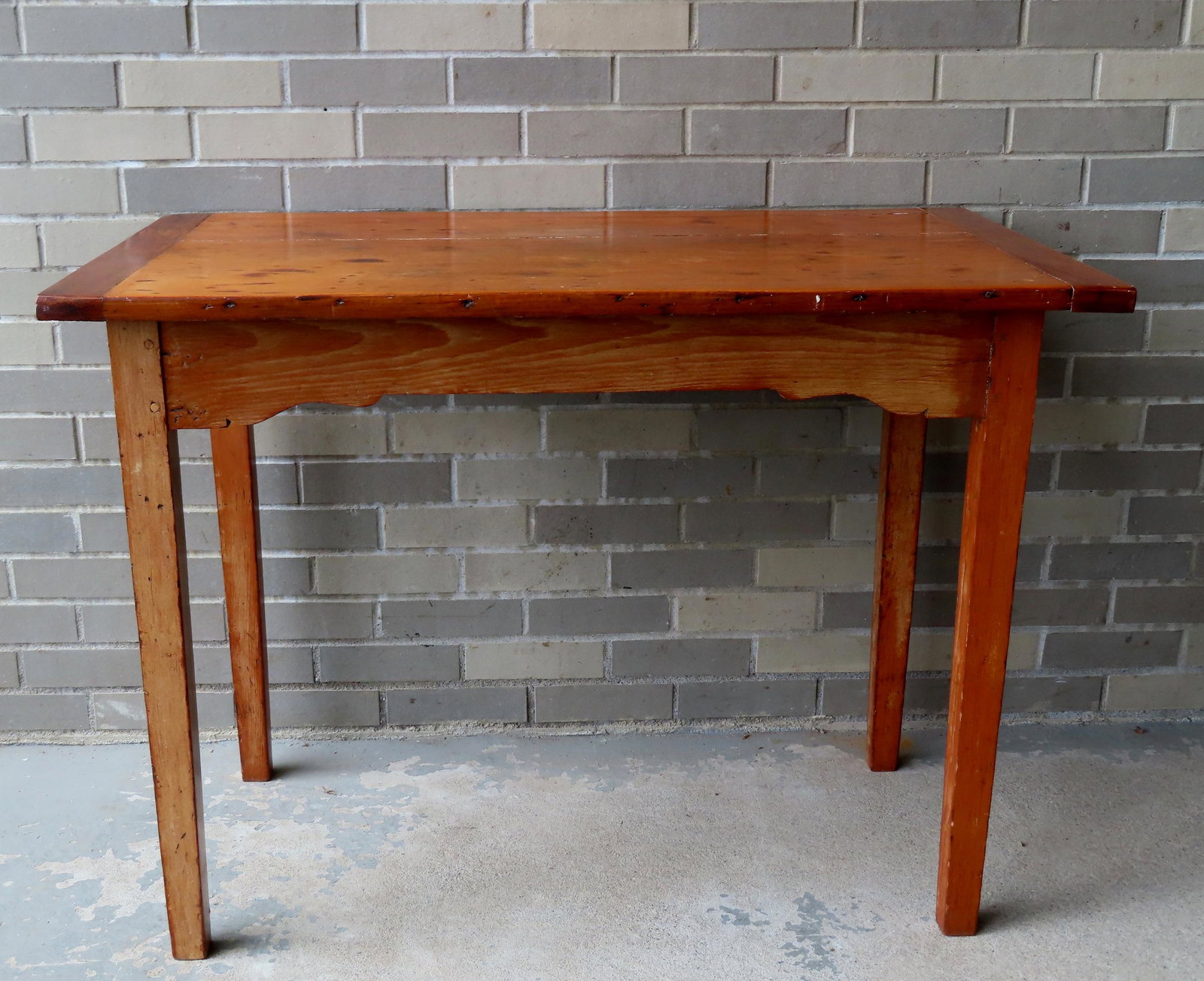 A refinished primitive tap table with side drawer and heavy tapered legs. The top with breadboard (1 of 10)