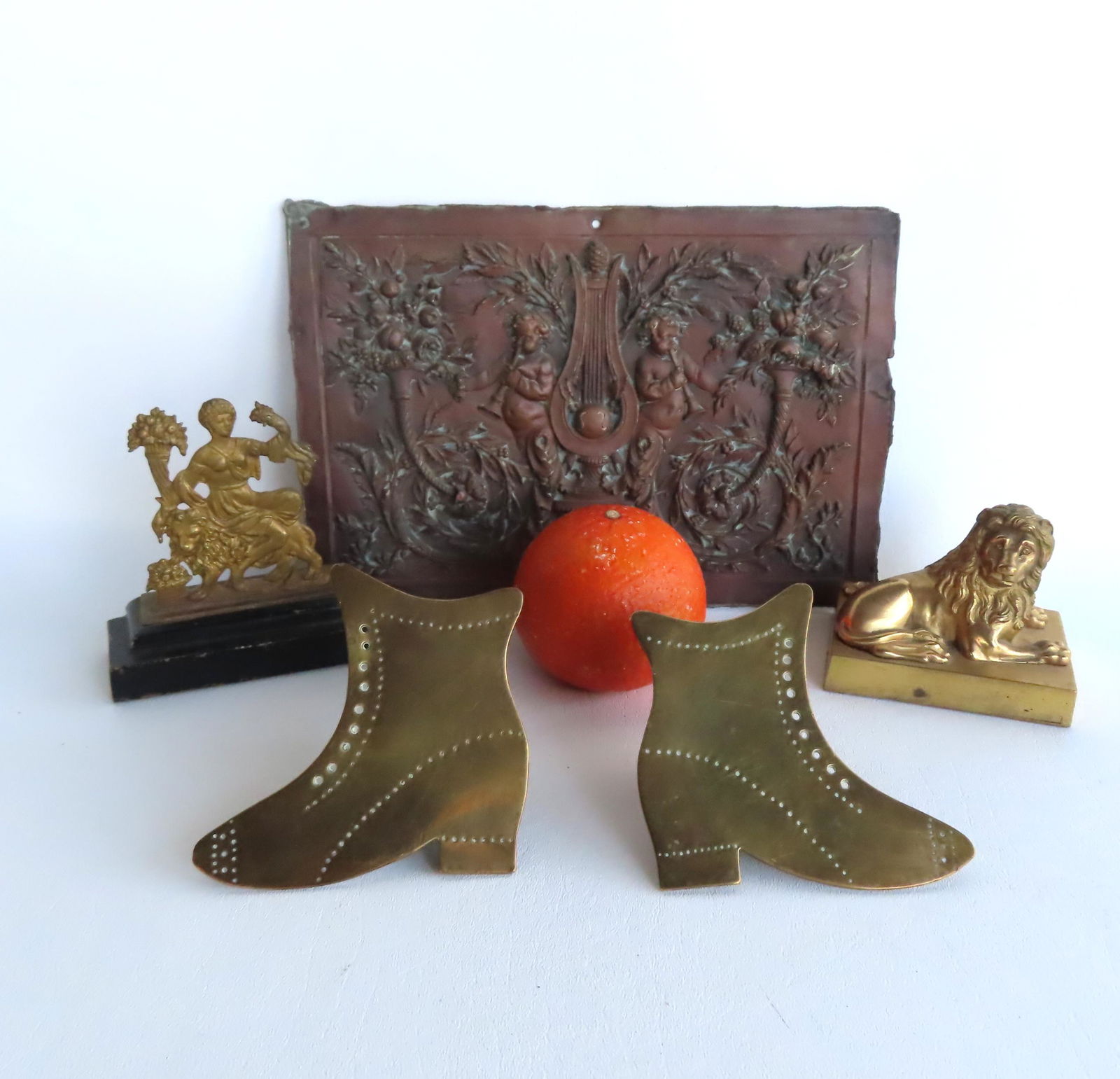 Grouping of 5 early decorative objects including: An ornate classical molded plaque having a: Grouping of 5 early decorative objects including: An ornate classical molded plaque having a central image of lyre extending from shaped plinth flanked by cherubs playing horns adjacent to scrolled vi