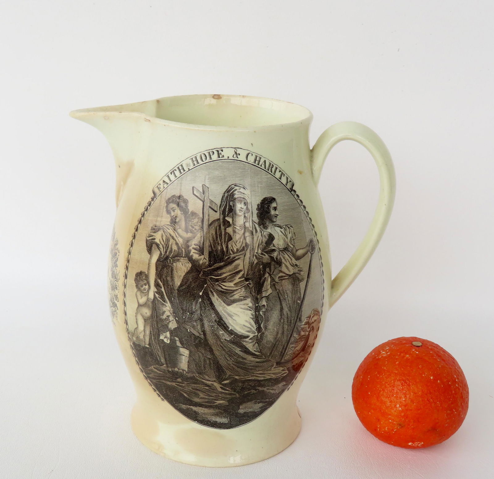 Liverpool creamware pitcher marked "Faith, Hope and Charity" on one side with religious figures, and (1 of 6)