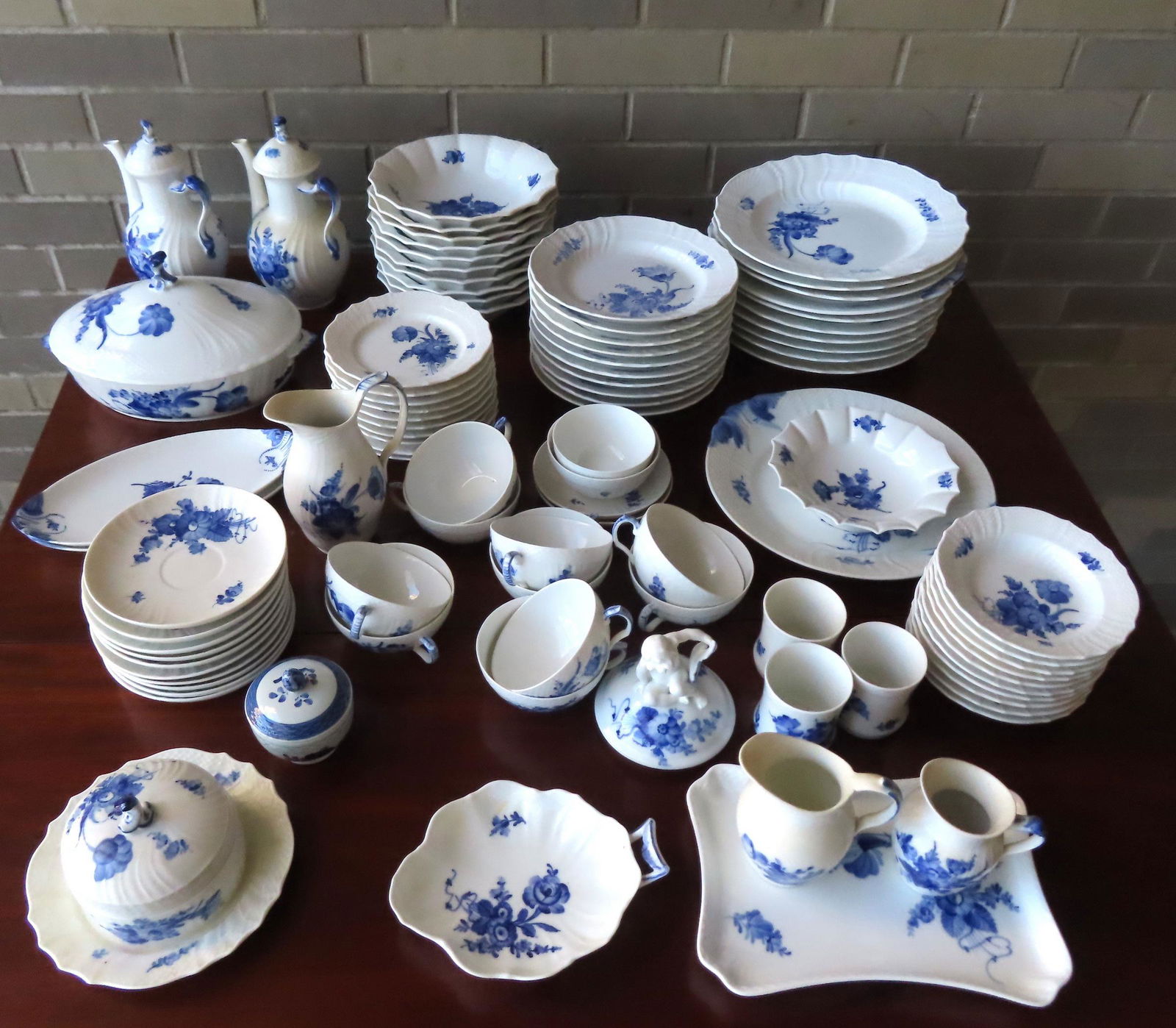 A set of Royal Copenhagen china, service for 10 (88 pieces), marked on base "Royal Copenhagen / (1 of 20)