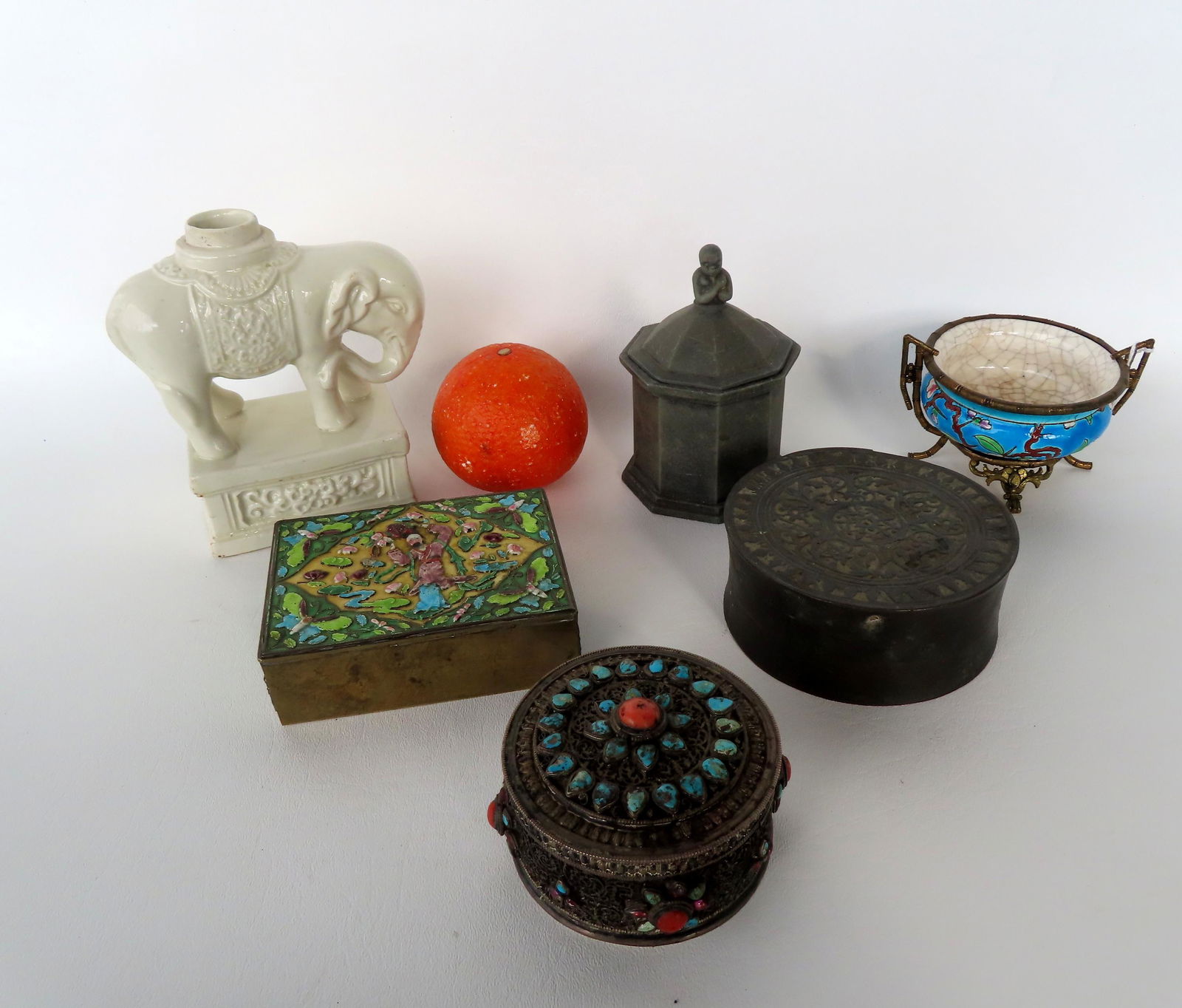 Grouping of 6 early porcelain and metal objects including: An enameled brass cigarette box marked (1 of 19)