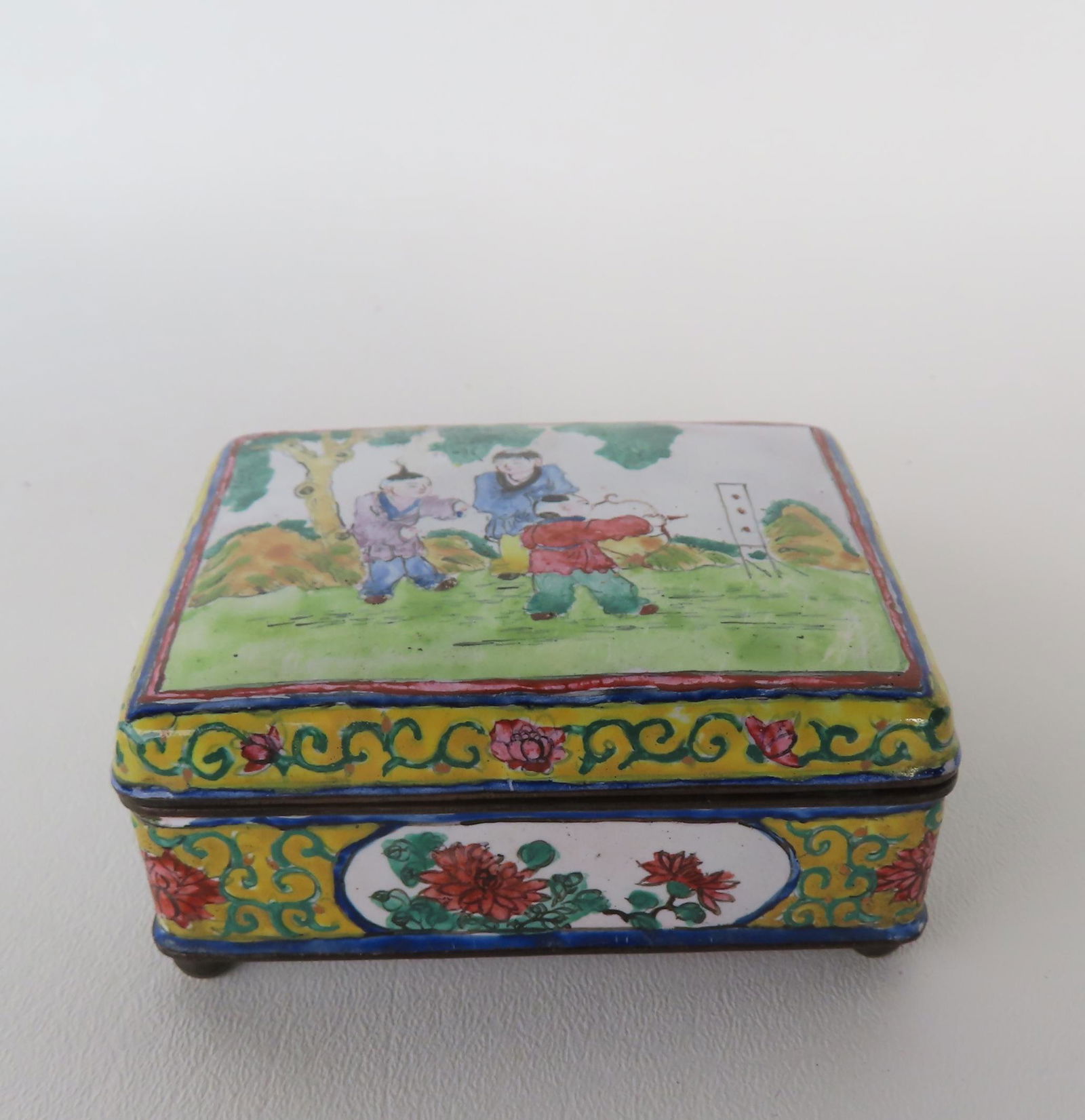 A Chinese enameled and  hand painted dresser box decorated with an archery scene on the lid and (1 of 6)