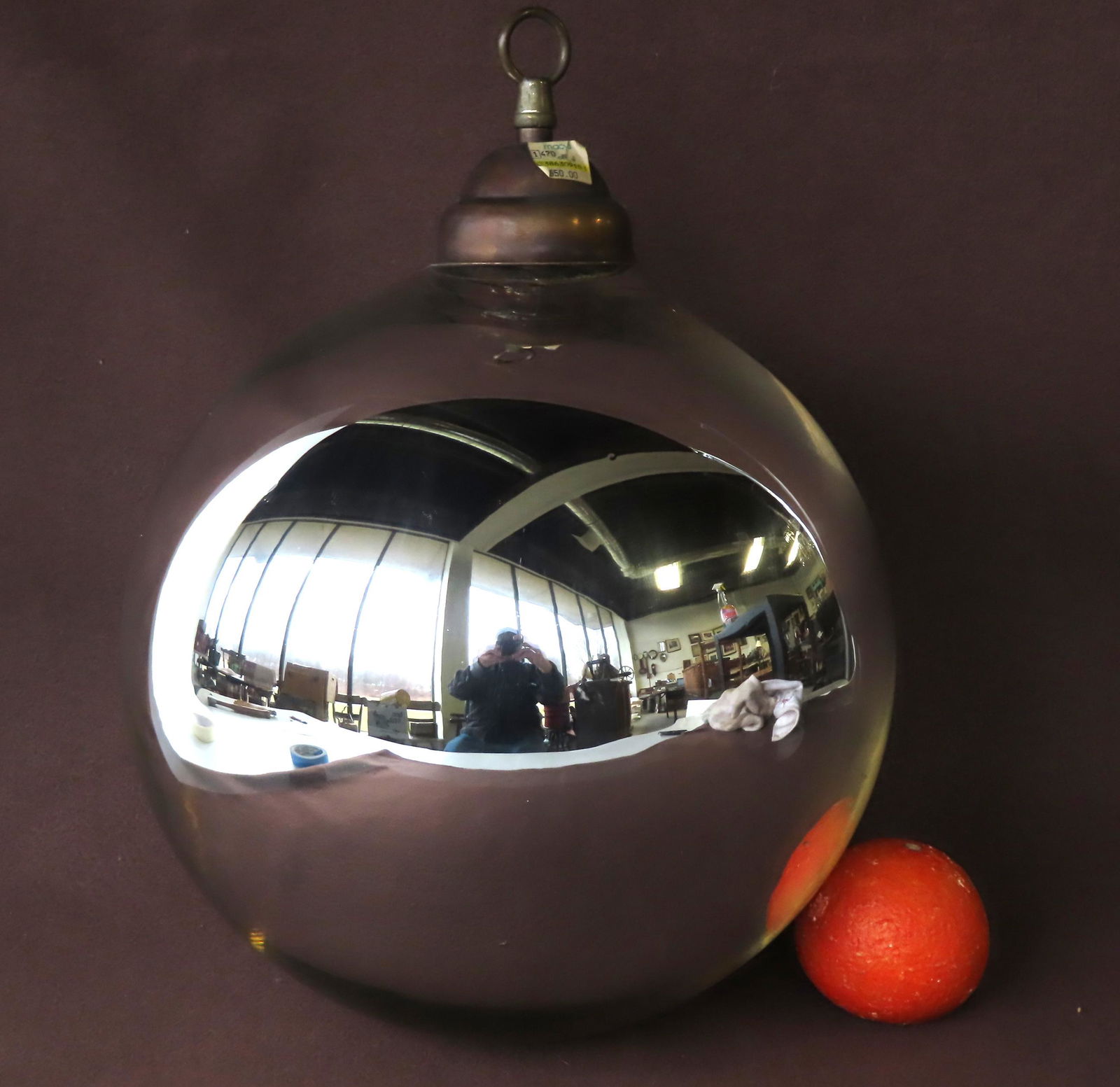 One large silver kugel with an attached Macy's department store label with retail price of $550 - (1 of 6)