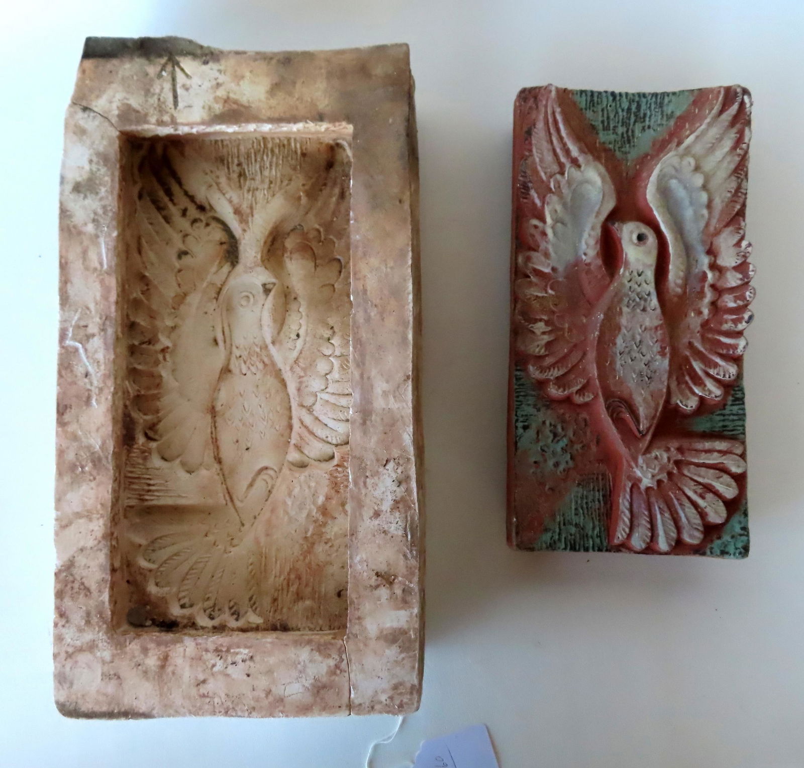 Walter Addison, New York, 1914-1982. A hand painted clay tile depicting a spread wing dove, a symbol (1 of 9)