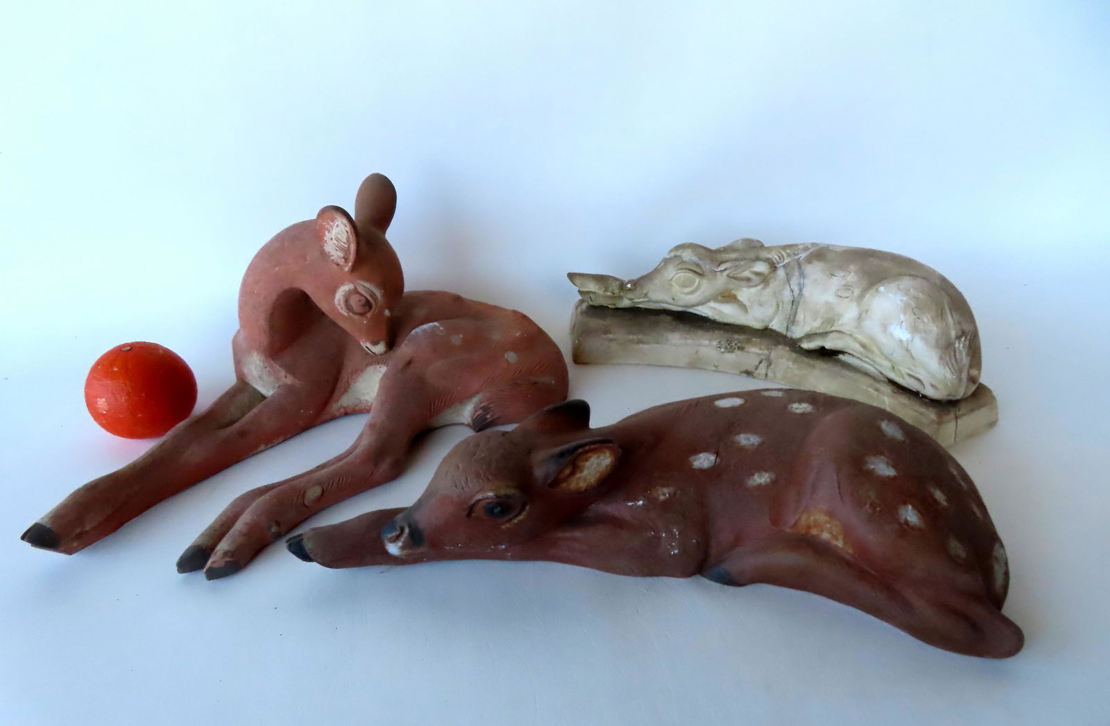 Walter Addison, New York, 1914-1982.  A grouping of 3 resting fawn sculptures, including a plaster (1 of 10)