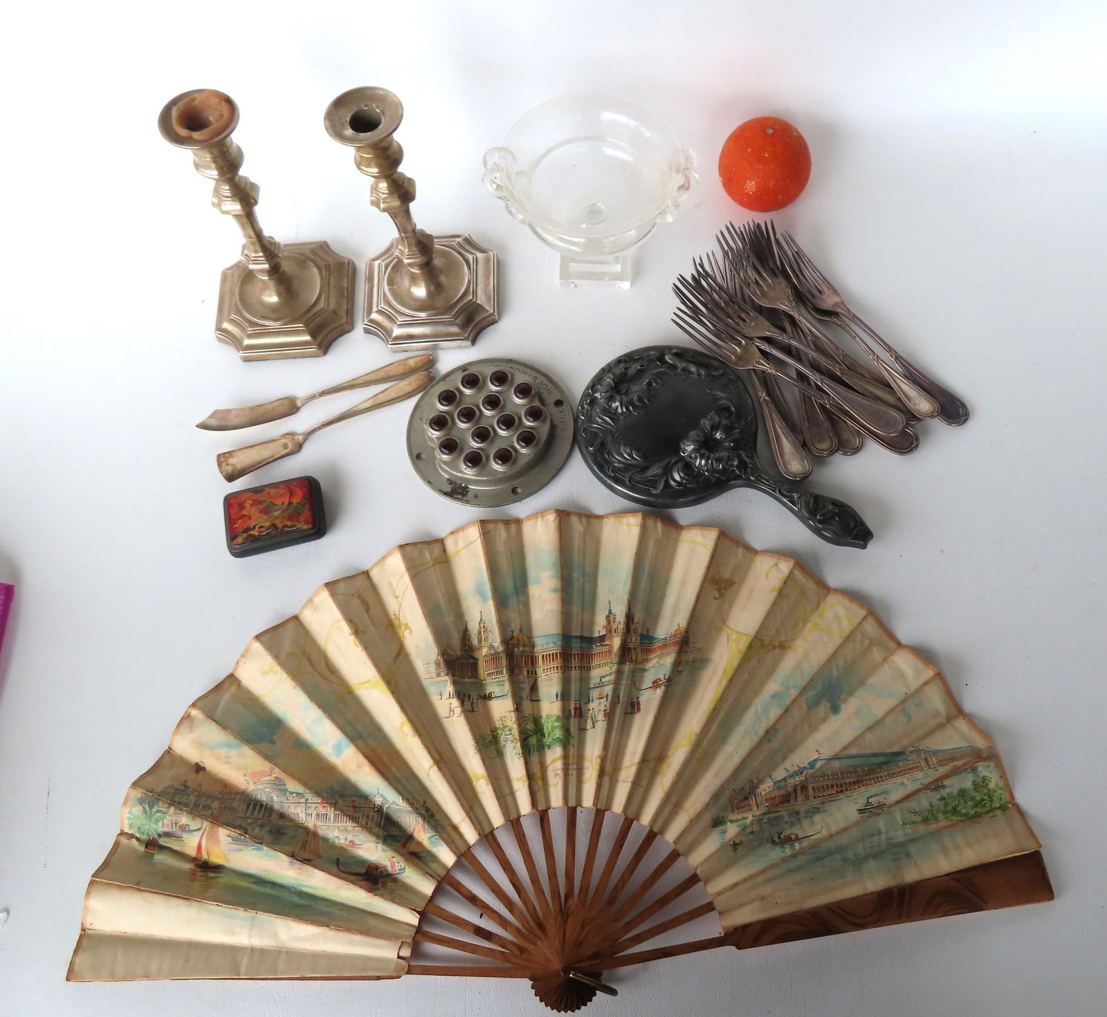 A grouping of decorative objects including: A double handle Steuben urn shaped compote on stepped: A grouping of decorative objects including: A double handle Steuben urn shaped compote on stepped pedestal base - excellent condition, no damage or repairs - 4 1/2"H x 6 1/4"W; a pair of signed "Barke