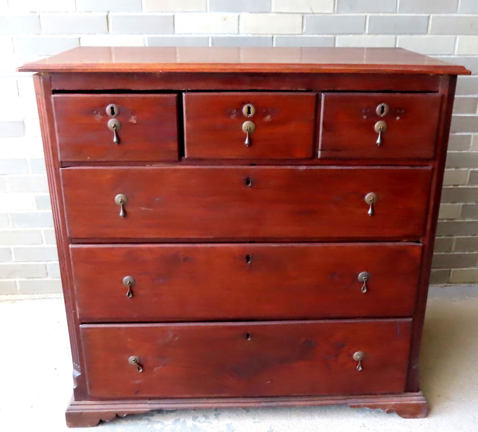 A Chippendale walnut 6 drawer chest having a top with molded edge, over 3 short drawers also with (1 of 12)