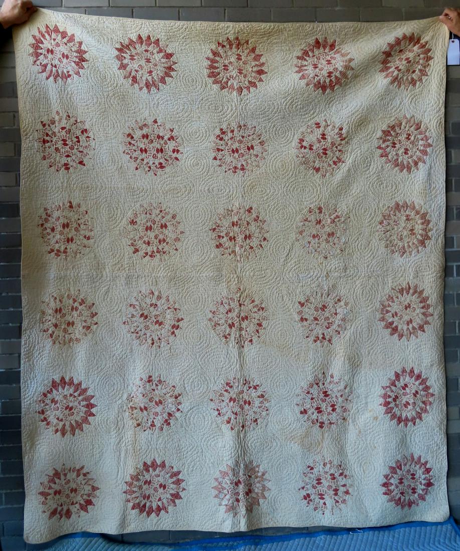 A patchwork quilt, star or floral pattern, with 4 quilted hearts in the center of each, 76" x 93". (1 of 9)