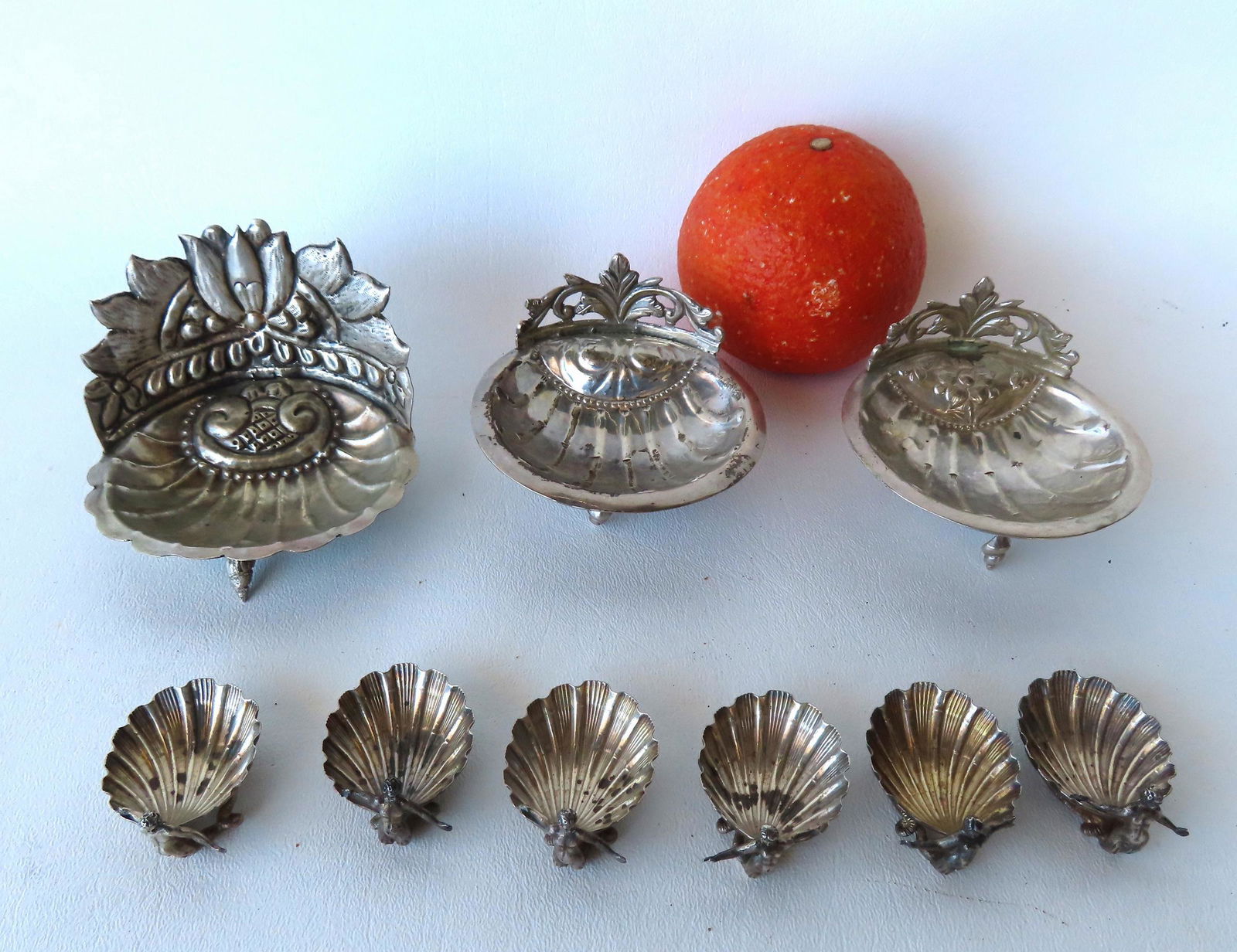 Grouping of unusual clam shaped footed salts, all unmarked, mid 19th century or earlier, possibly (1 of 15)