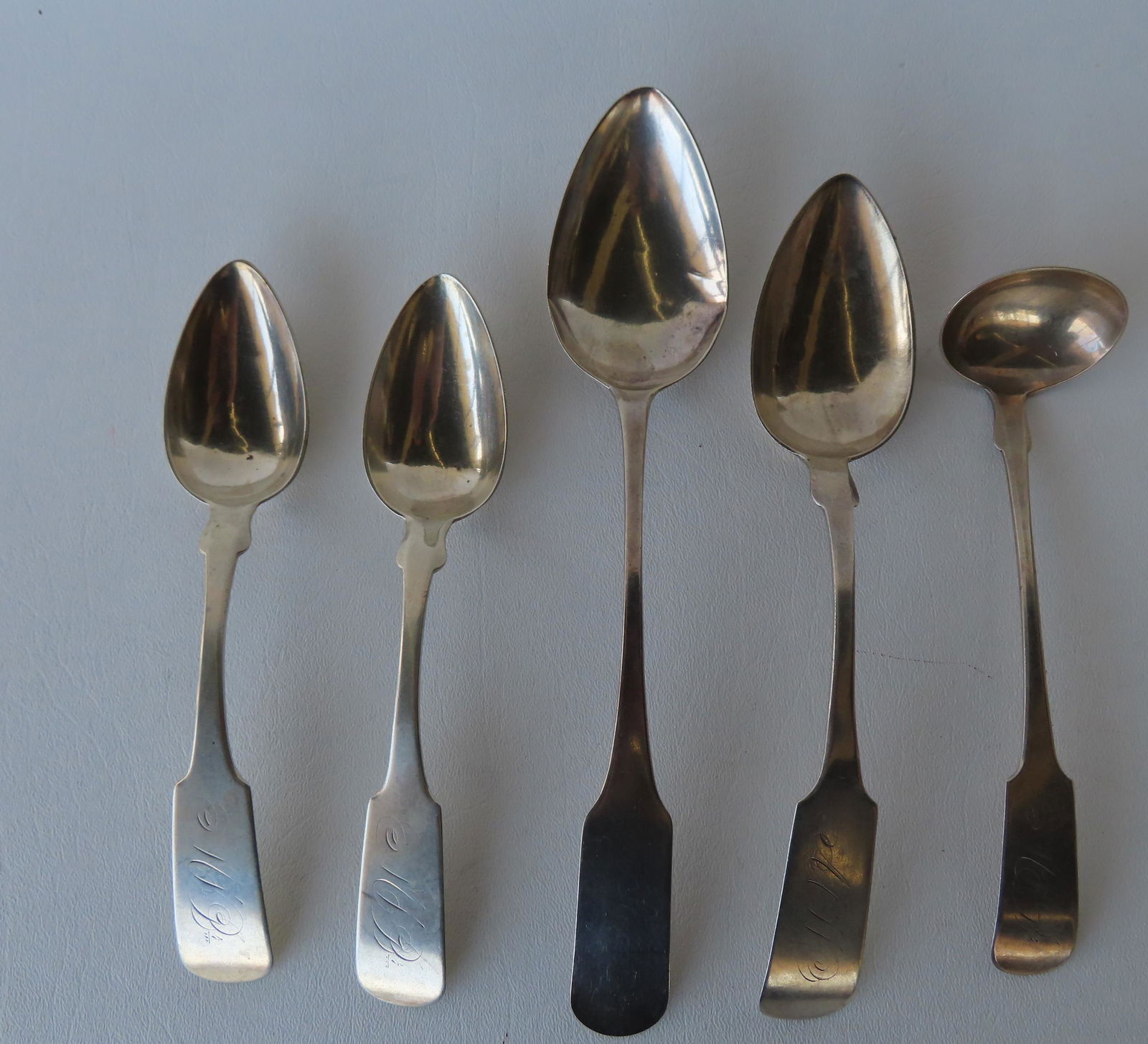 Grouping of 5 coin silver spoons including: Serving spoon signed J. Field - 9 3/4"L; ladle signed B. (1 of 5)