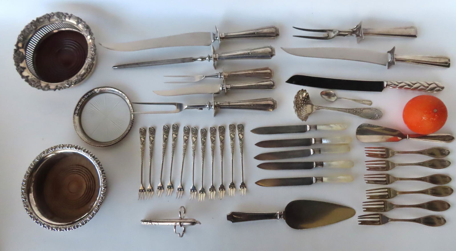 Grouping of mostly silver plate and items with sterling handles, including a Tiffany & Co. carving (1 of 12)